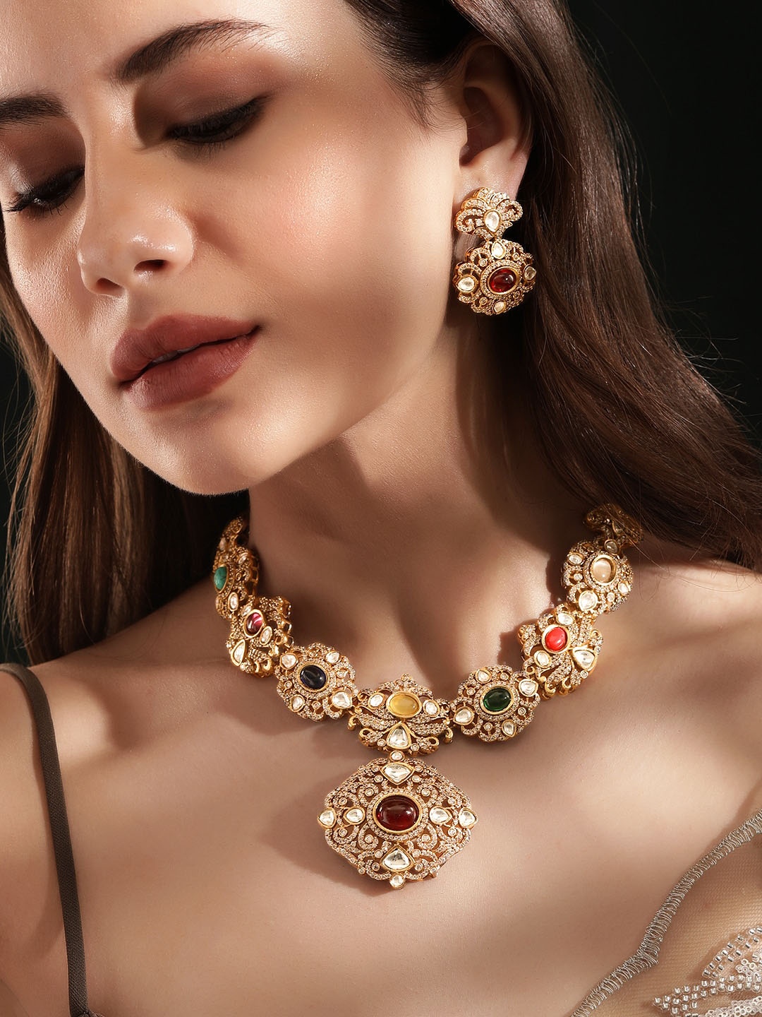 

Rubans Gold Plated American Diamond Stone Studded Reverse Jewellery Set
