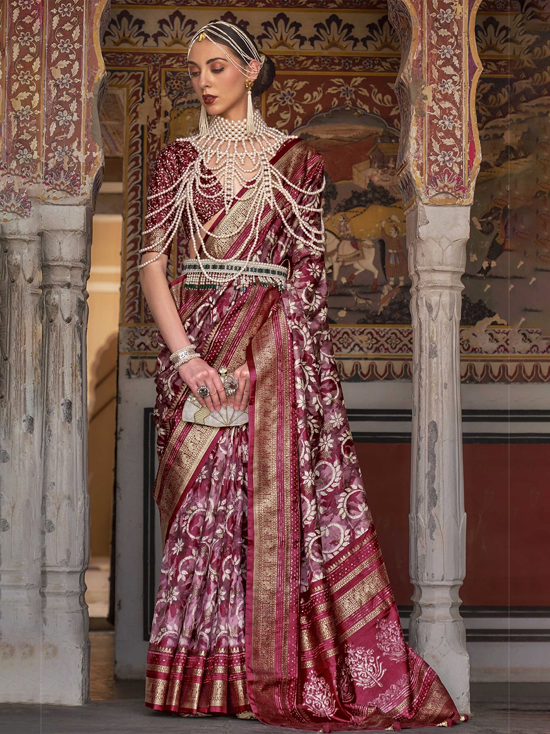 

Mitera Purple & White Floral Printed Zari Patola Saree