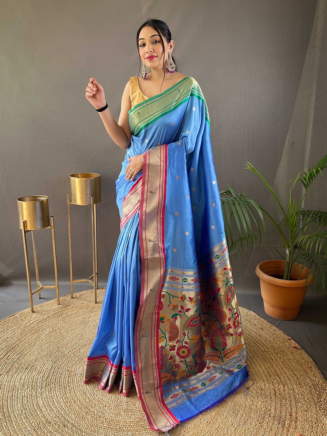 

Mitera Blue & Green Ethnic Motifs Woven Designed Zari Paithani Saree
