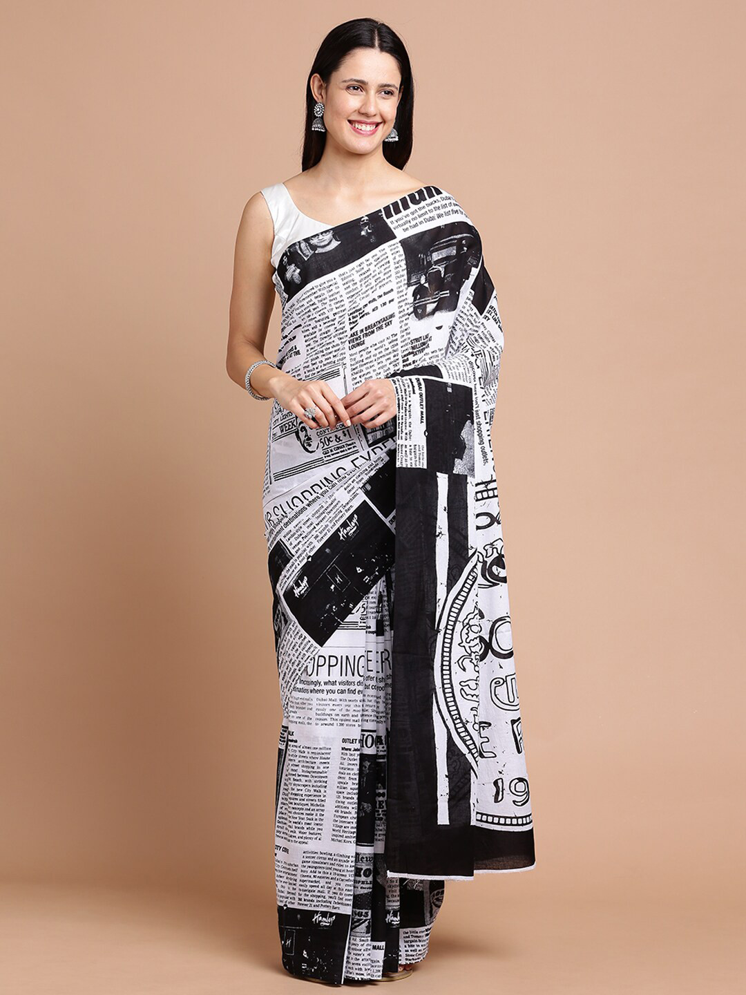 

Kalyan Silks Typography Printed Silk Cotton Saree, Black