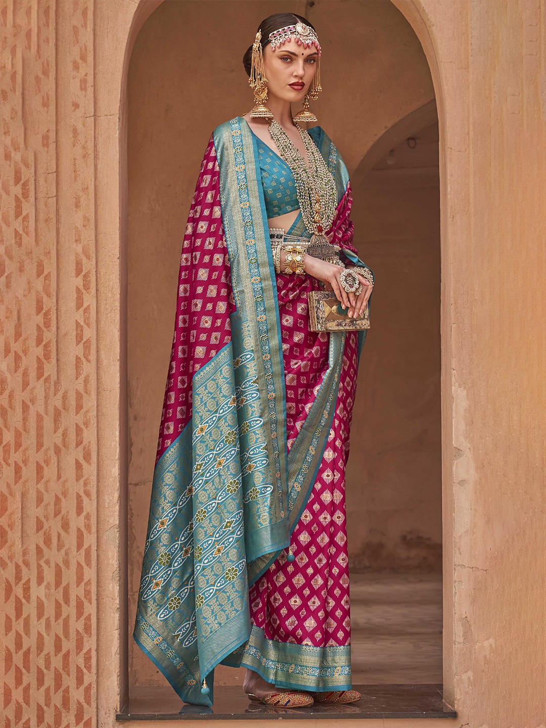 

Mitera Ethnic Motifs Woven Design Zari Patola Saree, Pink