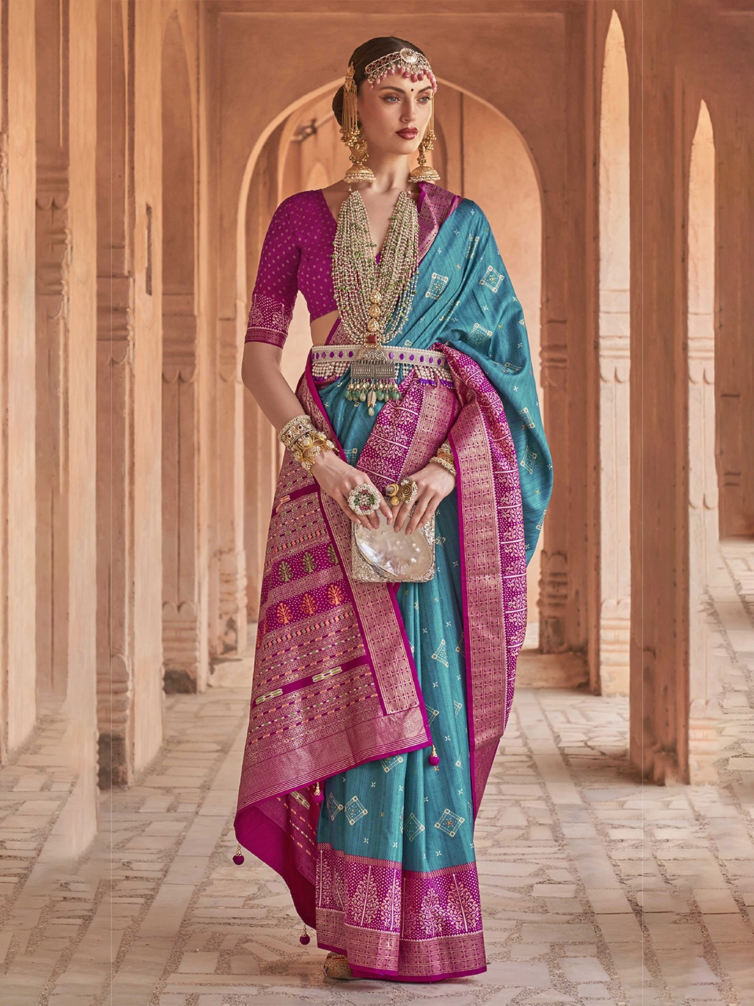 

Mitera Blue & Pink Embellished Zari Silk Blend Patola Saree
