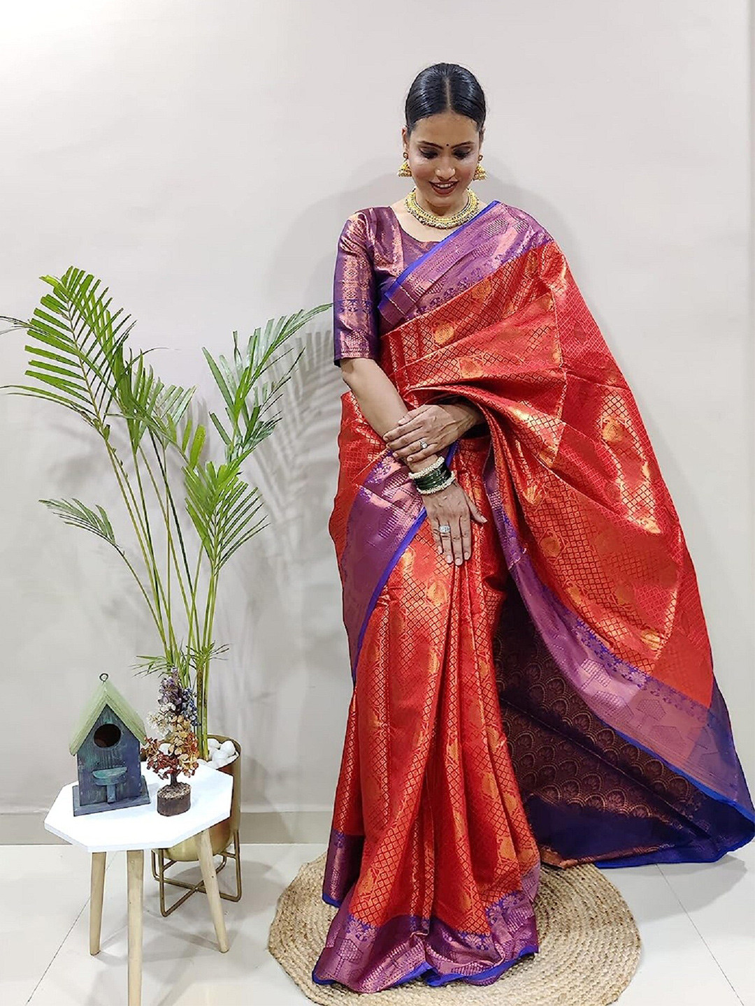 

APNISHA Red & Blue Woven Design Zari Pure Silk Banarasi Saree