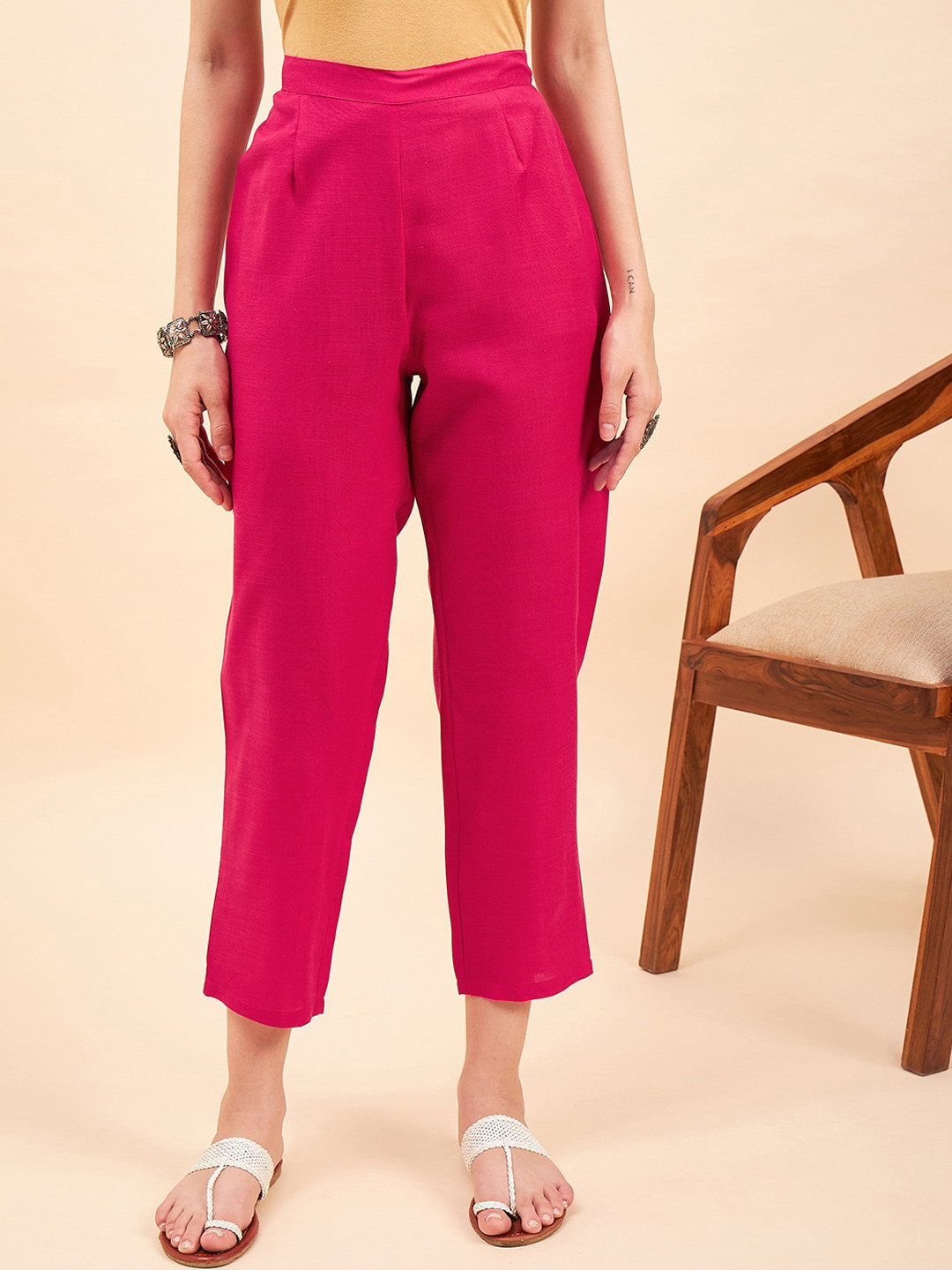 

Sangria Women Pink Mid-Rise Relaxed Straight Fit Cropped Trousers