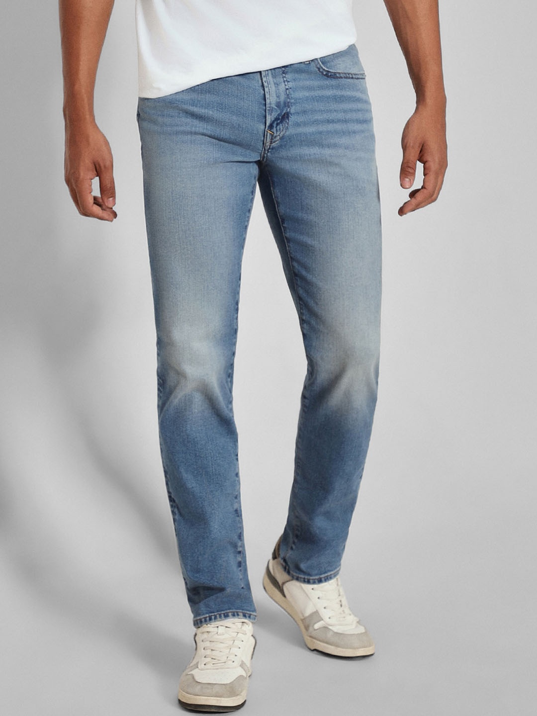 

AMERICAN EAGLE OUTFITTERS Men Slim Fit Mid-Rise Clean Look Heavy Fade Stretchable Jeans, Blue