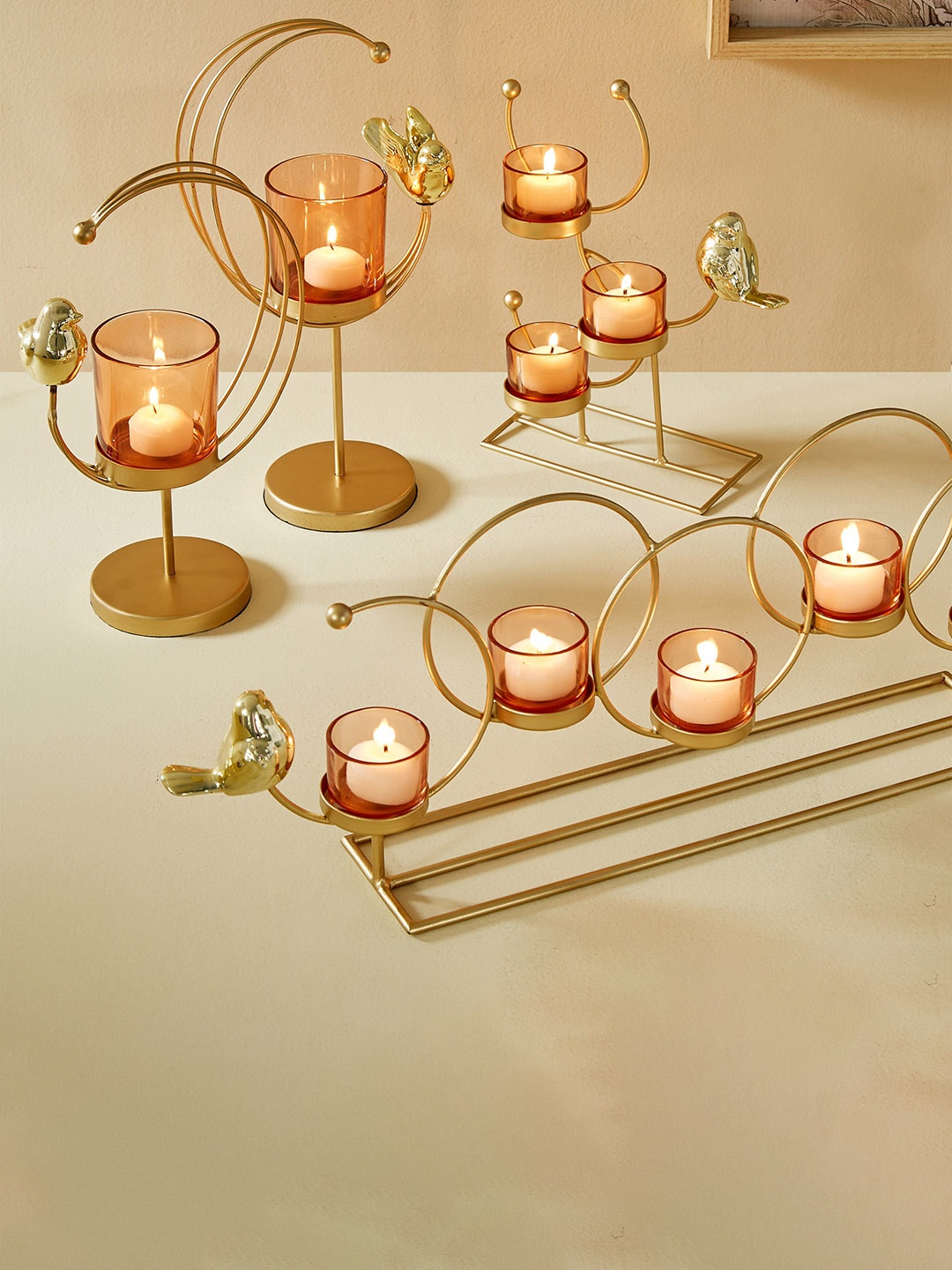 

Home Centre Wables Olympia Gold Toned & Orange 2 Pieces Votive Candle Holders