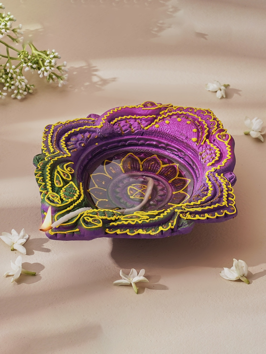 

Home Centre Corsica Fest Purple & yellow Terracotta AKhand Diya