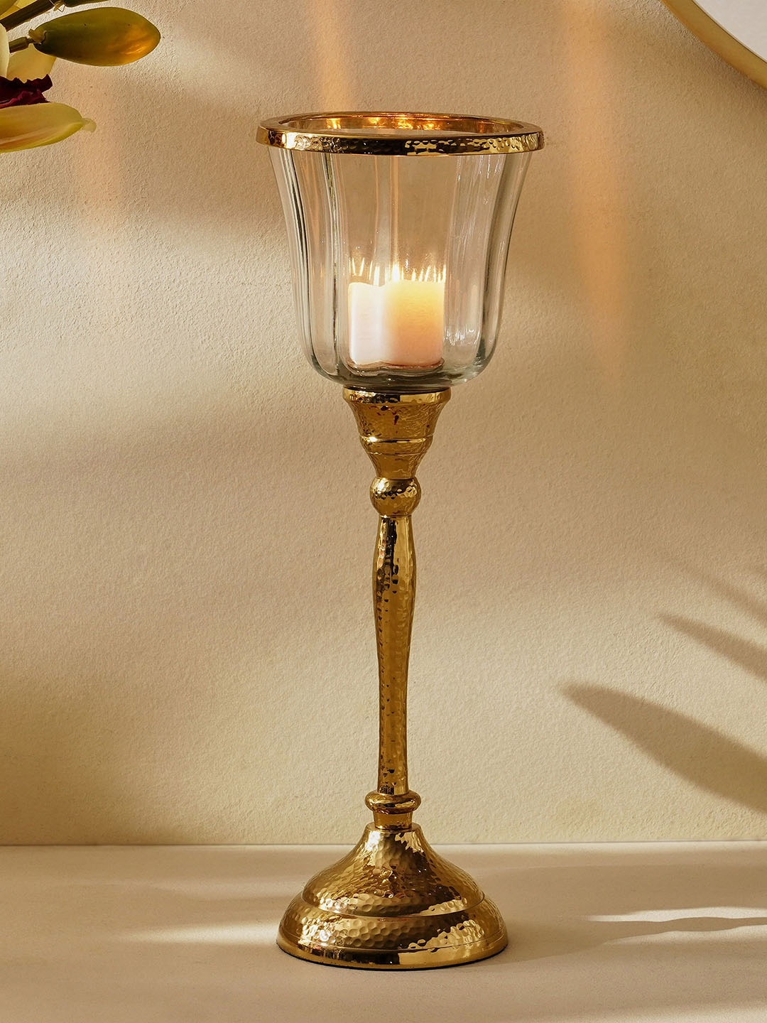 

Home Centre Splendid Gold Toned Textured Metal Candle Holder