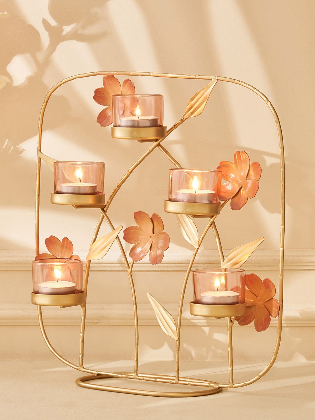 

Home Centre Moksha Gold Toned Glass T-Light Holder