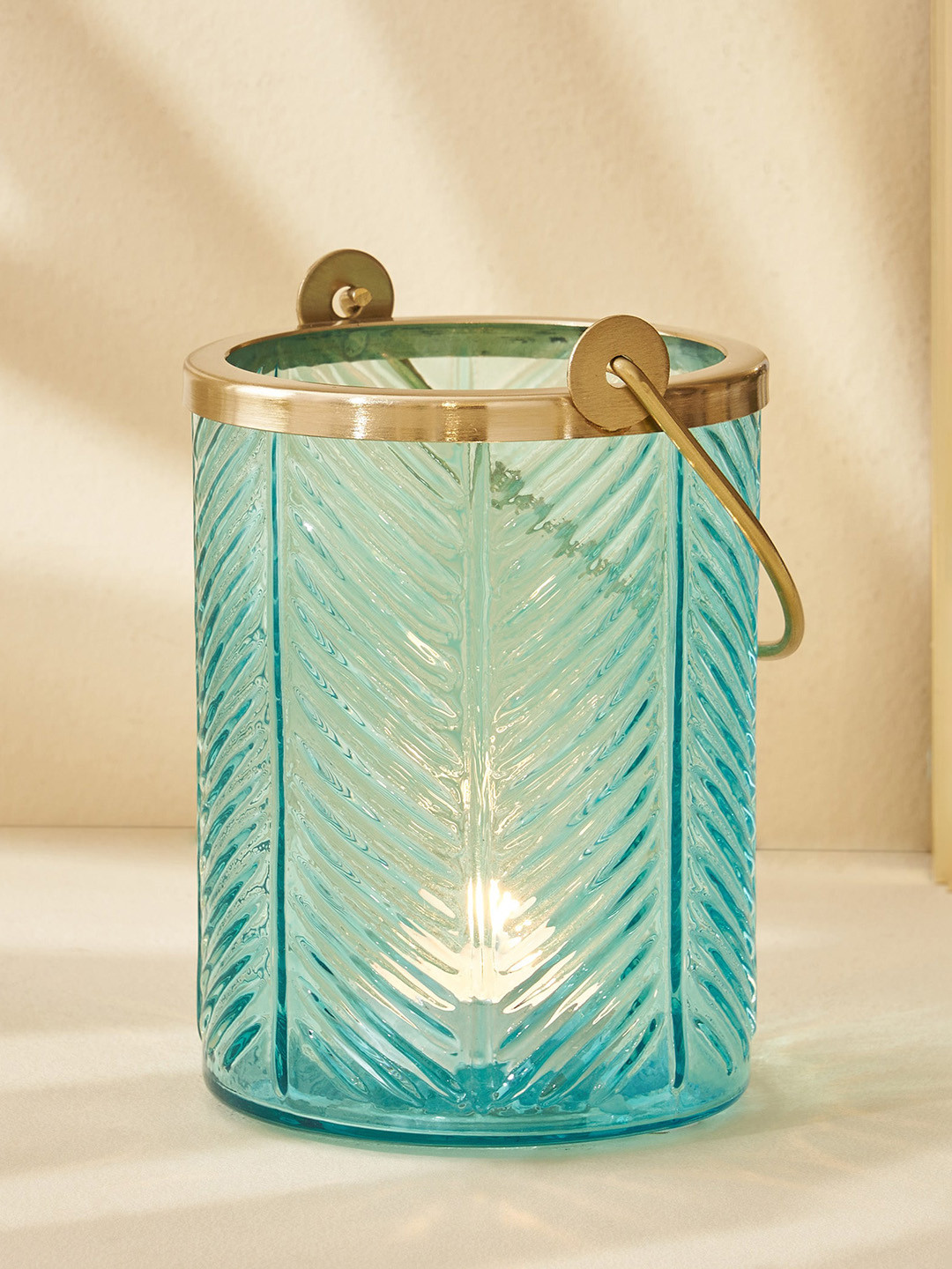 

Home Centre Brian Jacek Blue Textured Embossed Hanging Lantern