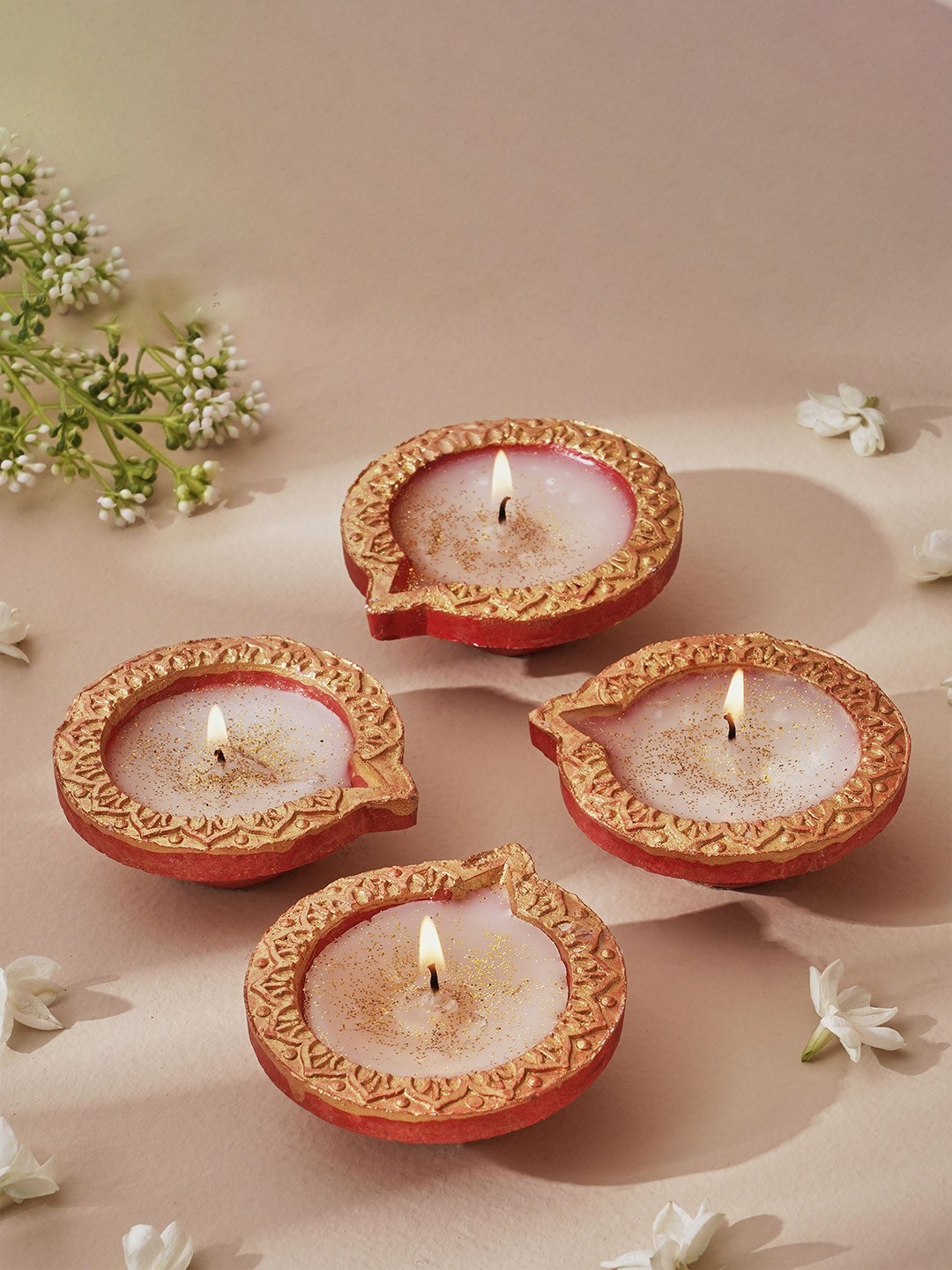 

Home Centre Corsica Fest Brown 4 Pieces Terracotta Diya Candles