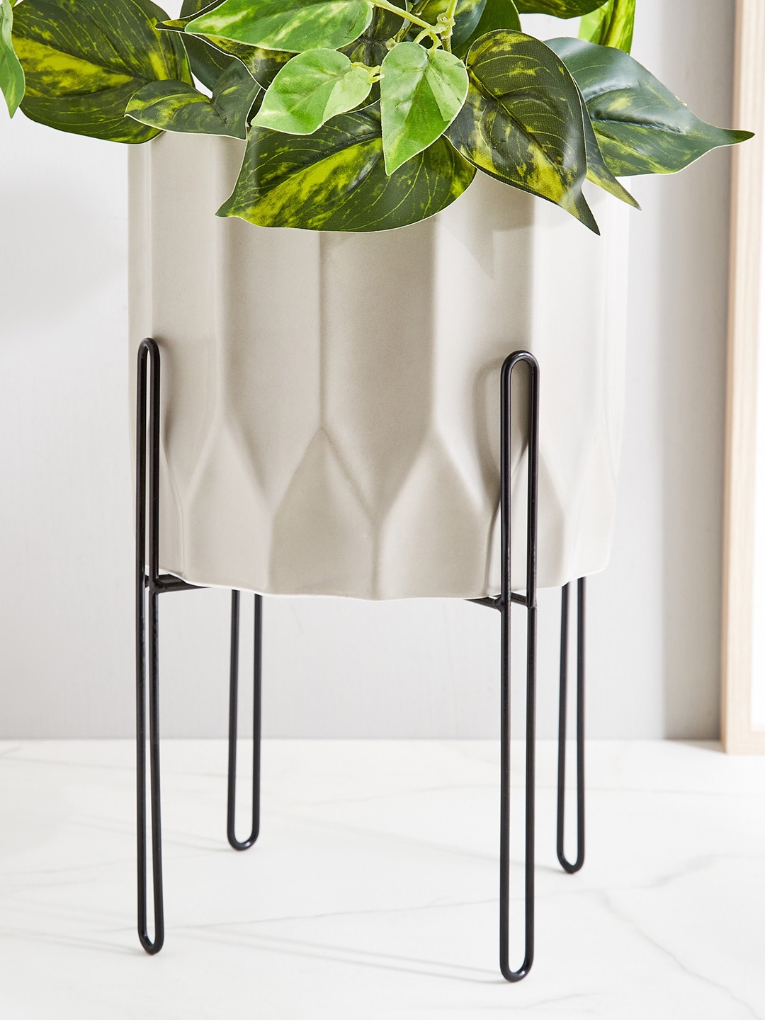 

Home Centre Gloria Argil Grey & Black Textured Ceramic Planter With Metal Stand