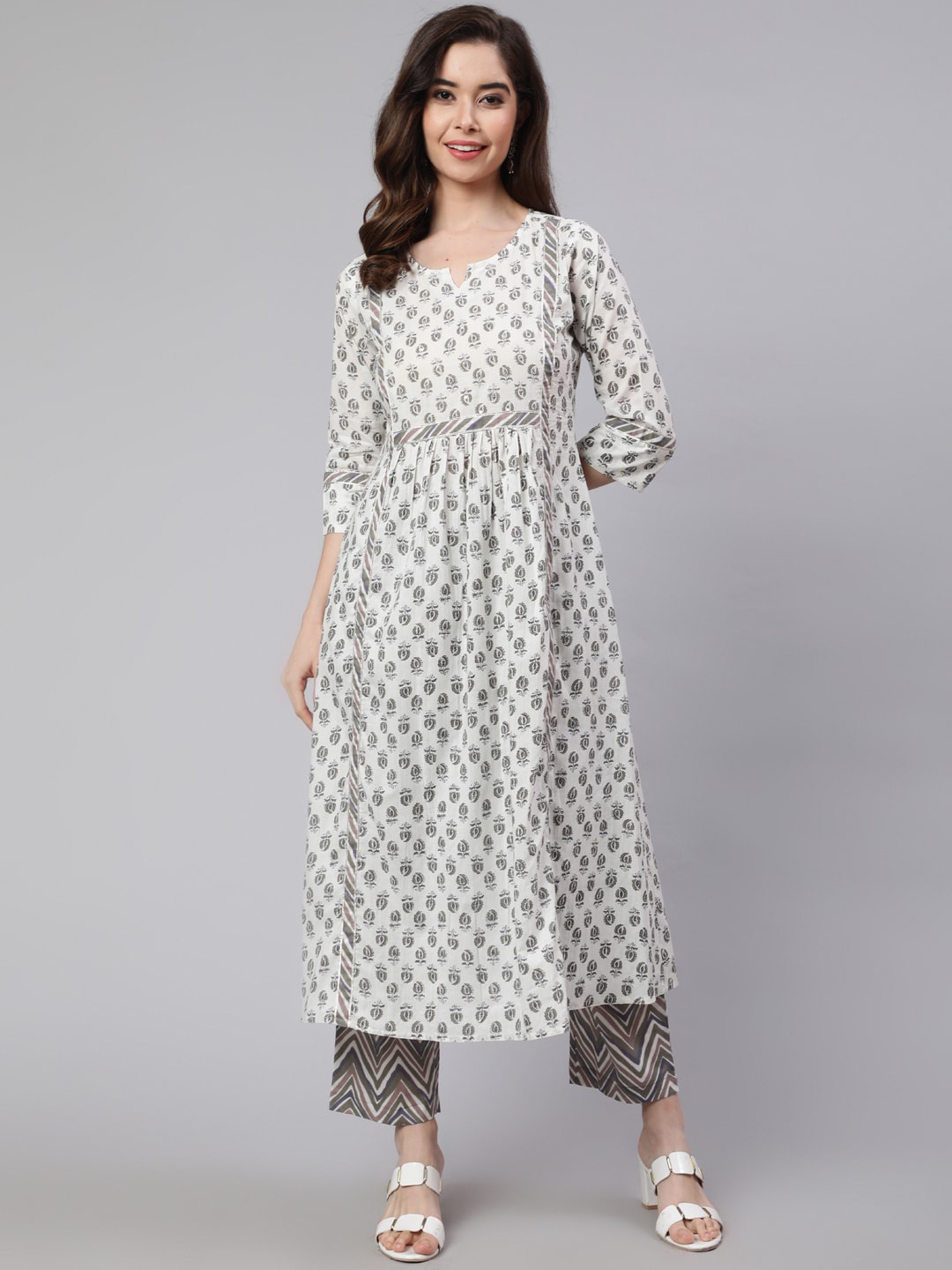 

Jaipur Kurti Flared Cotton Embroidered Kurta With Printed Palazzo, White