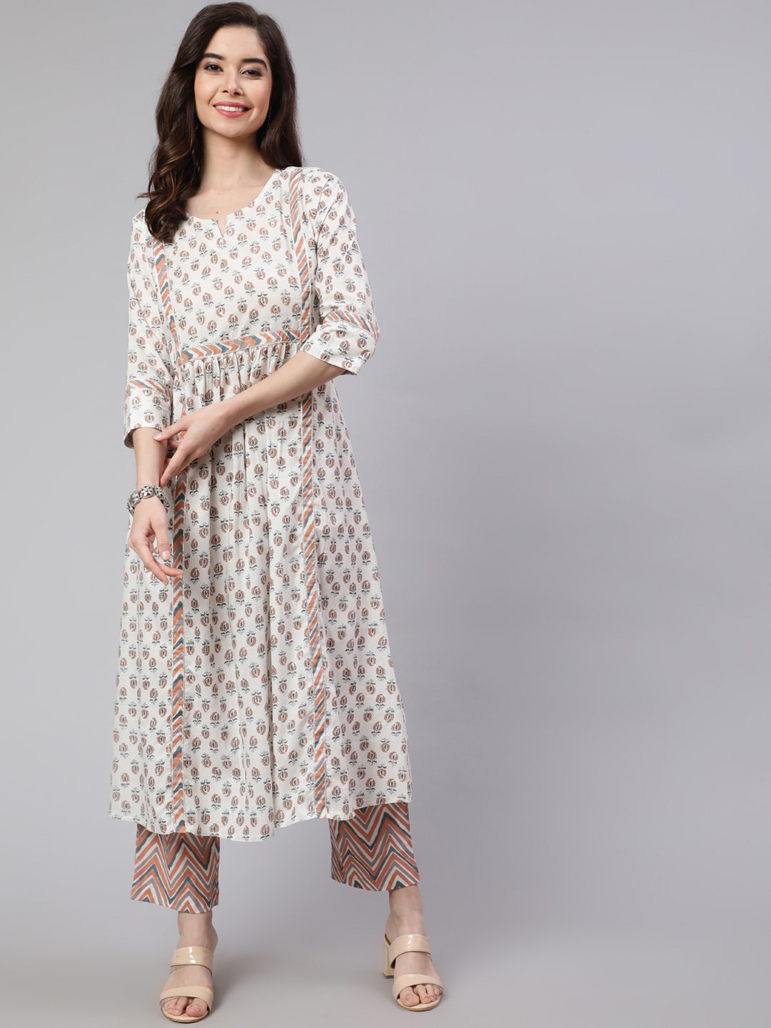 

Jaipur Kurti Flared Cotton Embroidered Kurta With Printed Palazzo, Peach