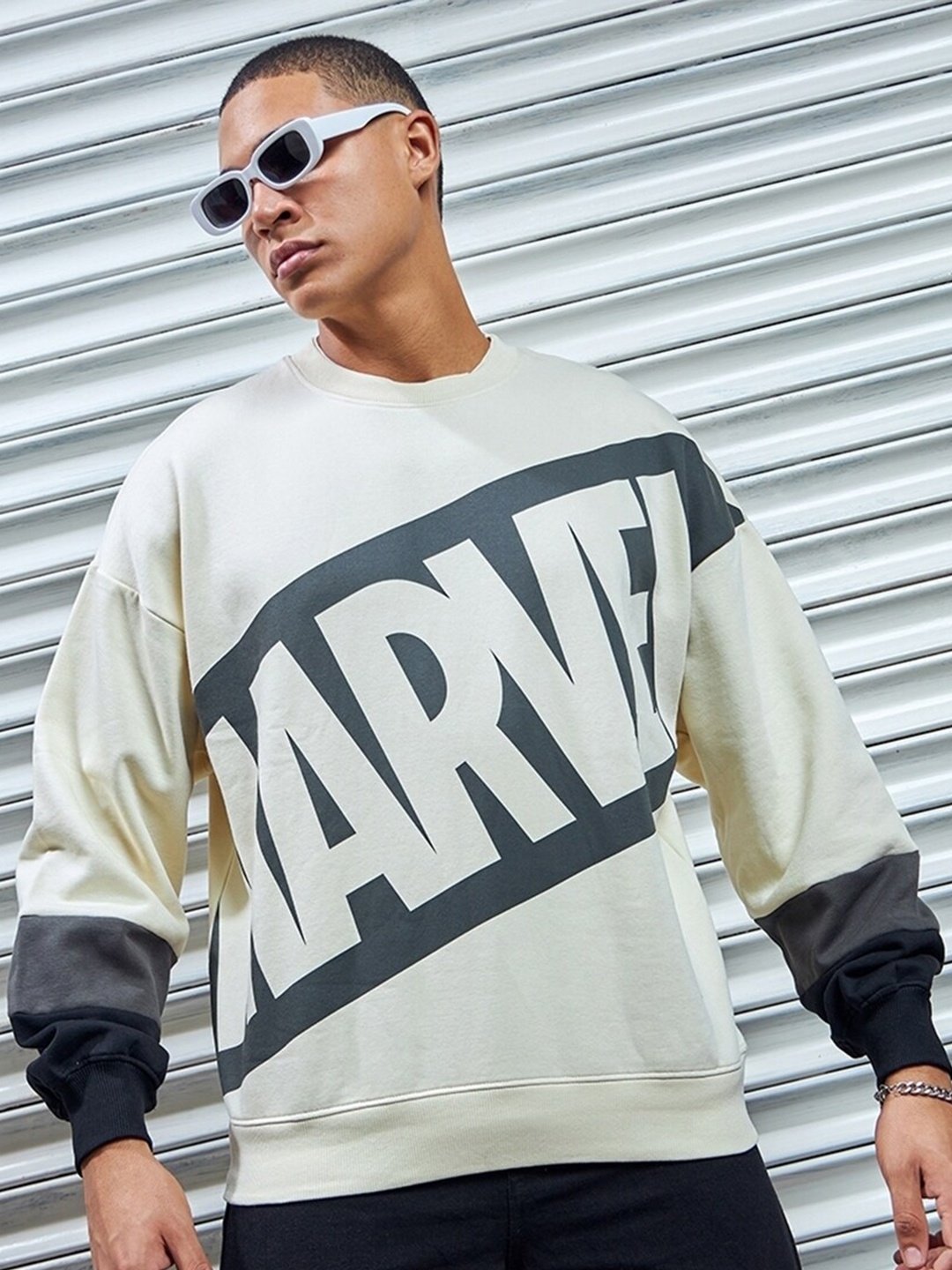 

Bewakoof Heavy Duty 1.0 Men Marvel Logo Typography Oversized Sweatshirt, Off white