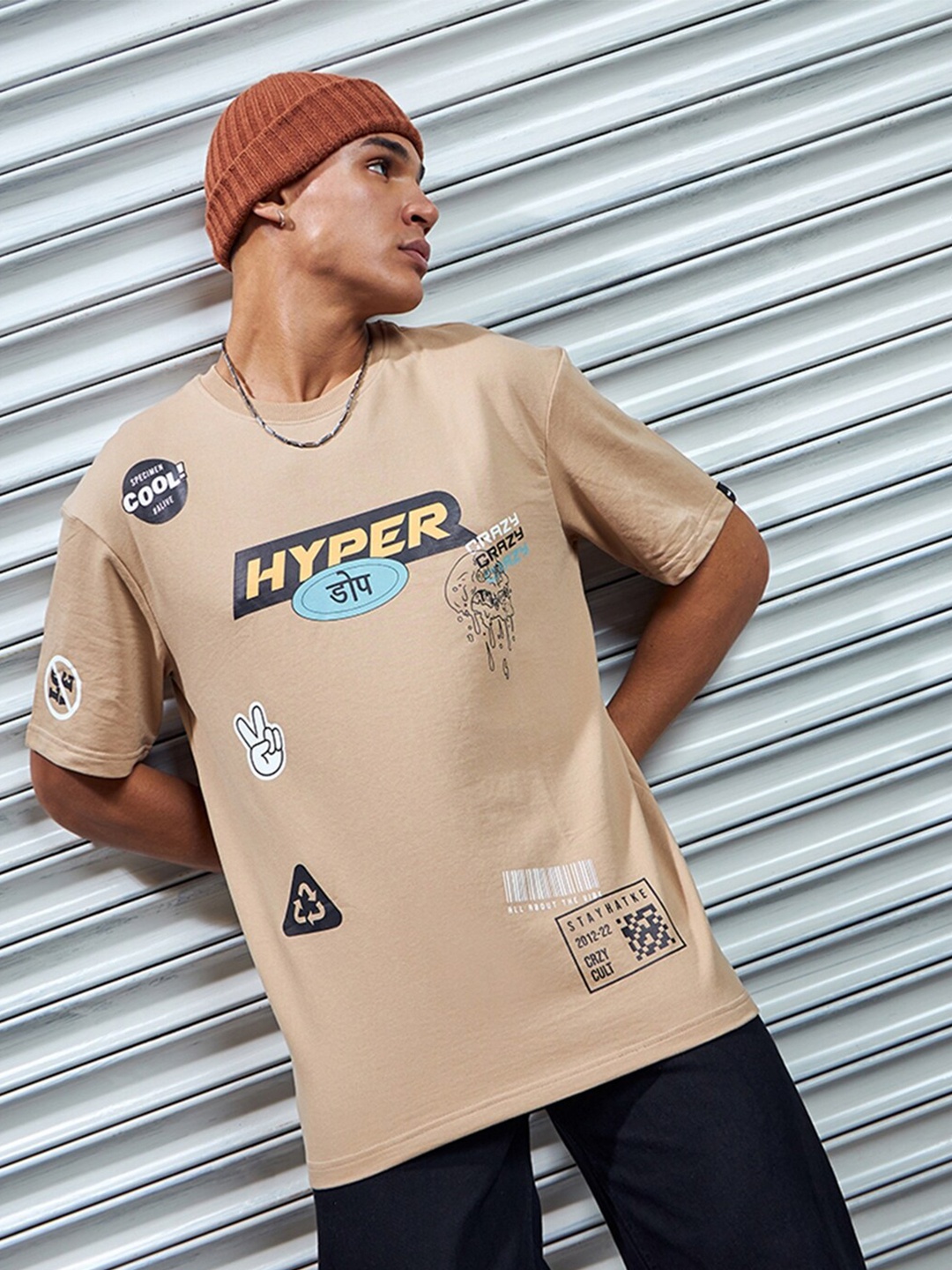 

Bewakoof Heavy Duty 1.0 Men Brown Graphic Printed Oversized T-shirt