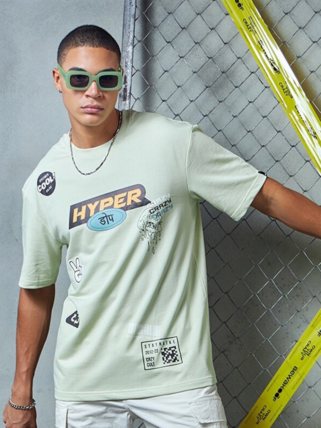 Bewakoof Heavy Duty 1.0 Men Green Graphic Printed Oversized T-shirt