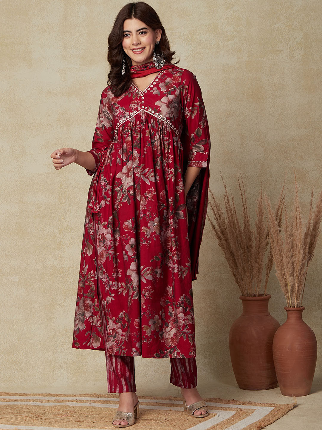 

FASHOR Maroon Floral Printed Empire Thread Work Kurta with Trousers & Dupatta