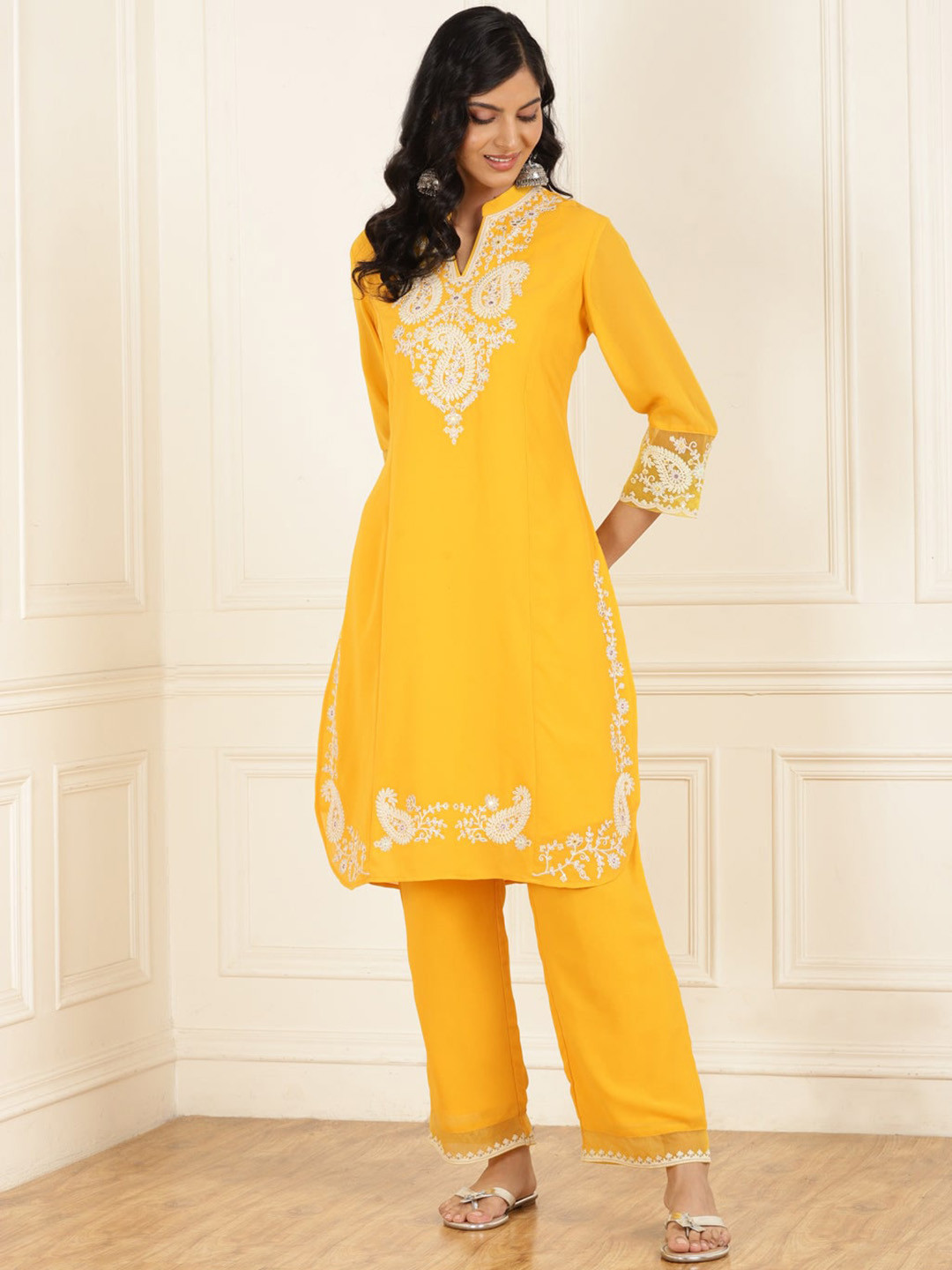 

Lakshita Paisley Yoke Design Panelled Thread Work Straight Kurta with Trousers, Yellow