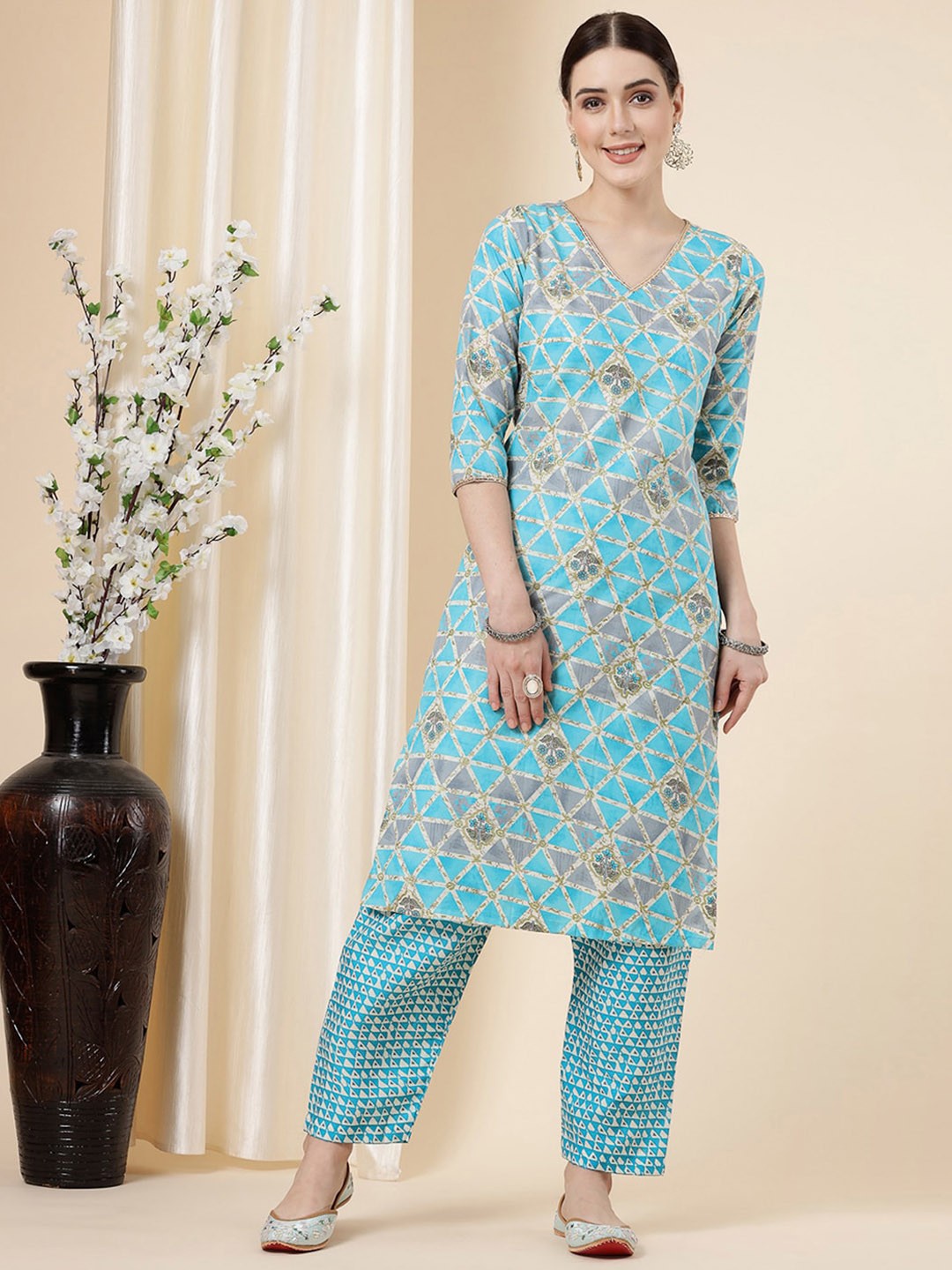 

KALINI Geometric Printed V-Neck Gotta Patti Straight Kurta with Trouser, Turquoise blue