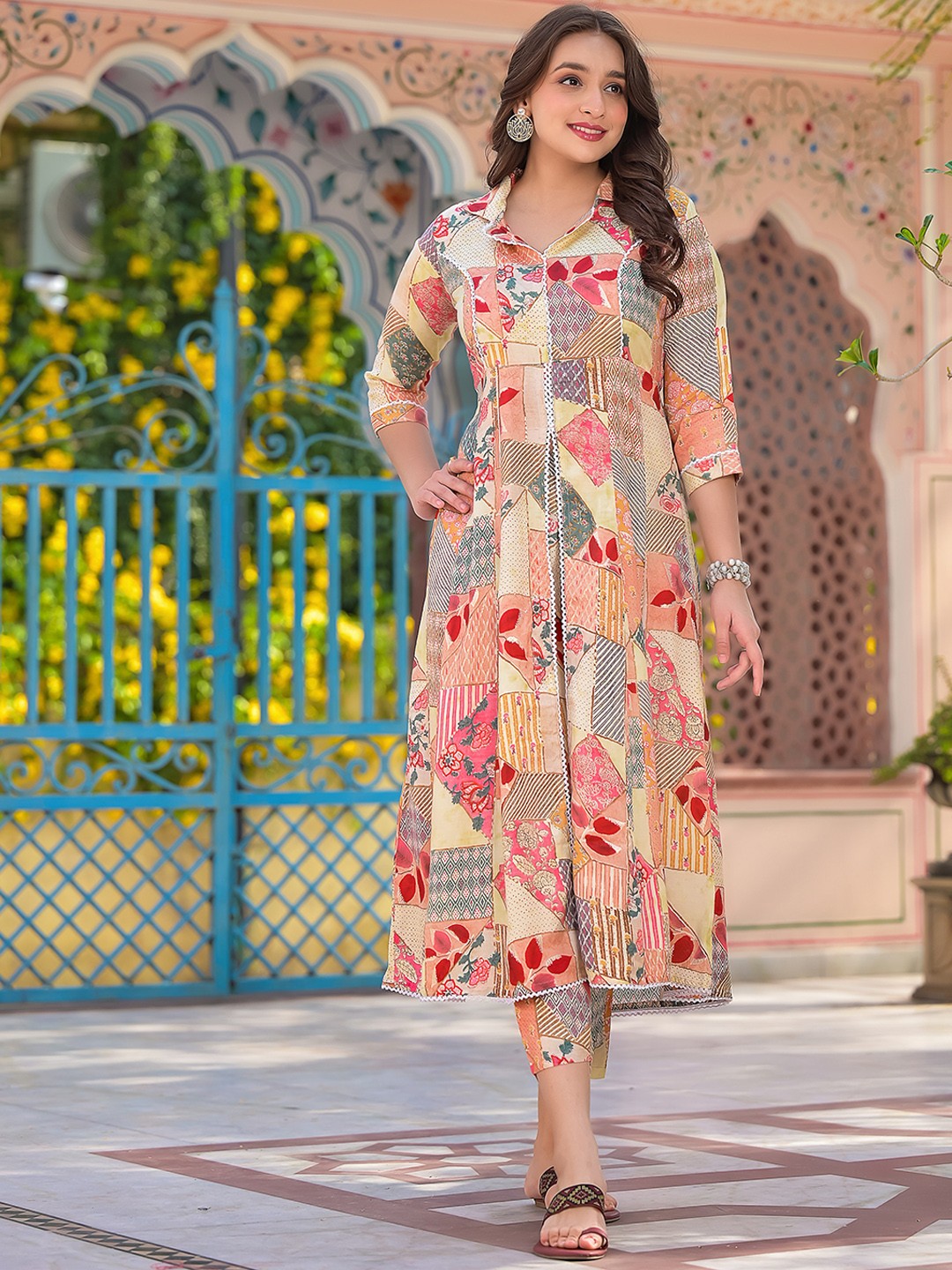 

Sangria Beige Ethnic Motifs Printed Lapel Collar A-Line Kurta With Trousers