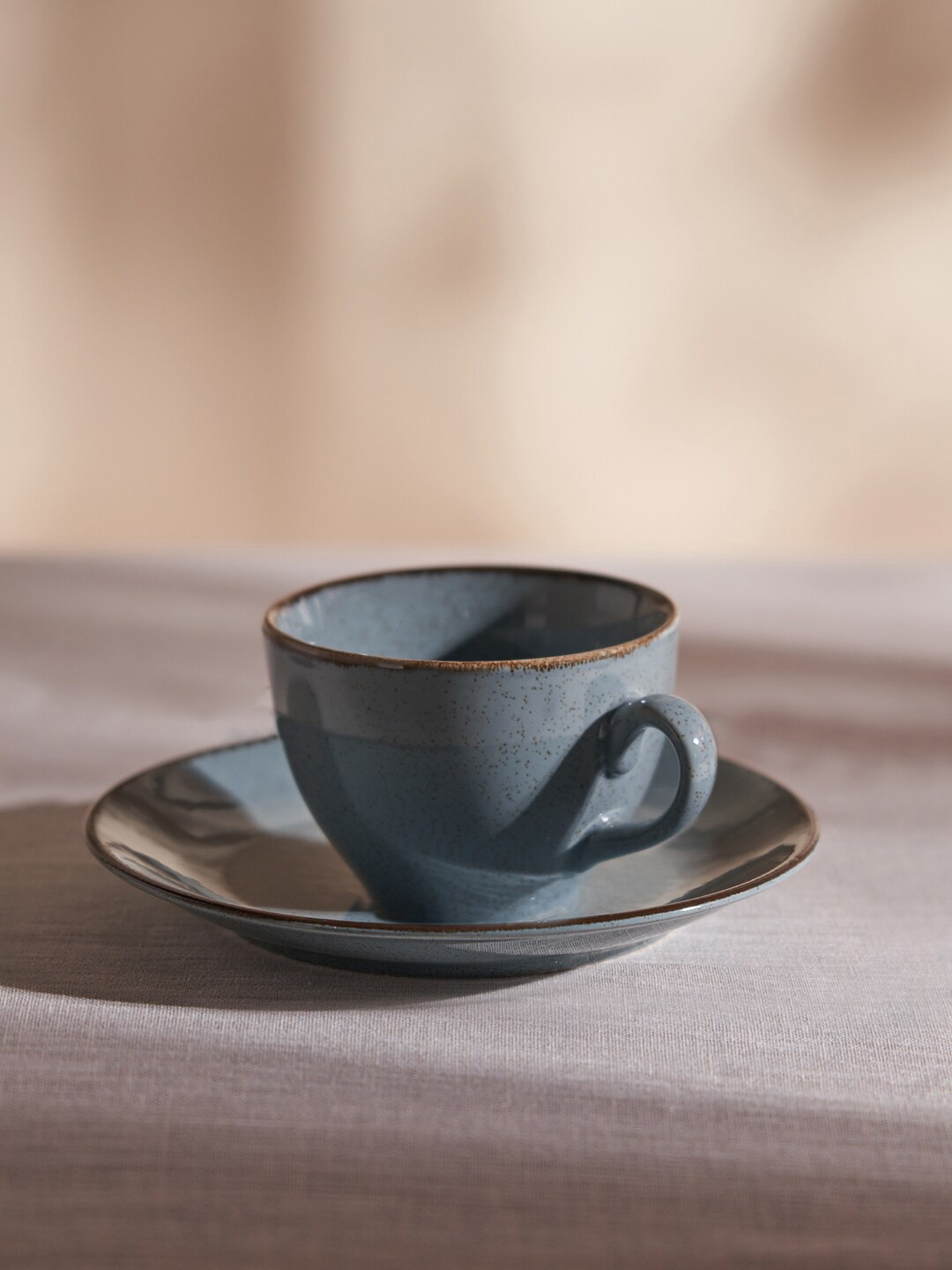 

Pure Home and Living 2 Pcs Blue Textured Porcelain Glossy Cup and Saucer - 250 ML Each