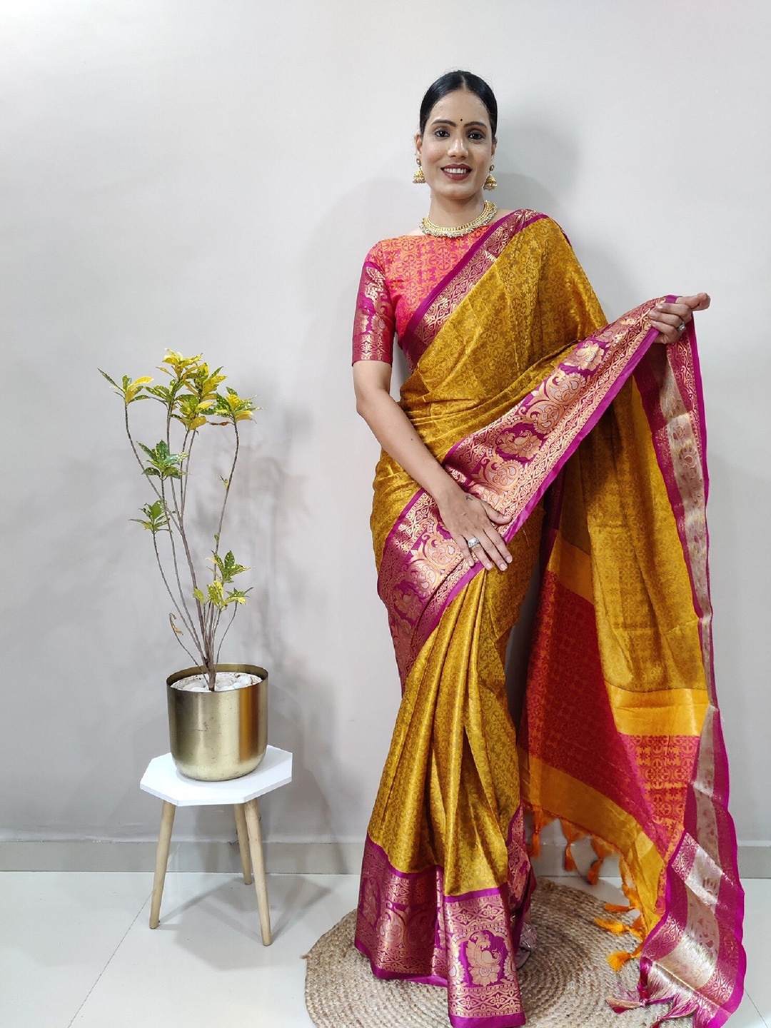 

APNISHA Ethnic Motifs Woven Design Zari Pure Silk Banarasi Saree, Mustard