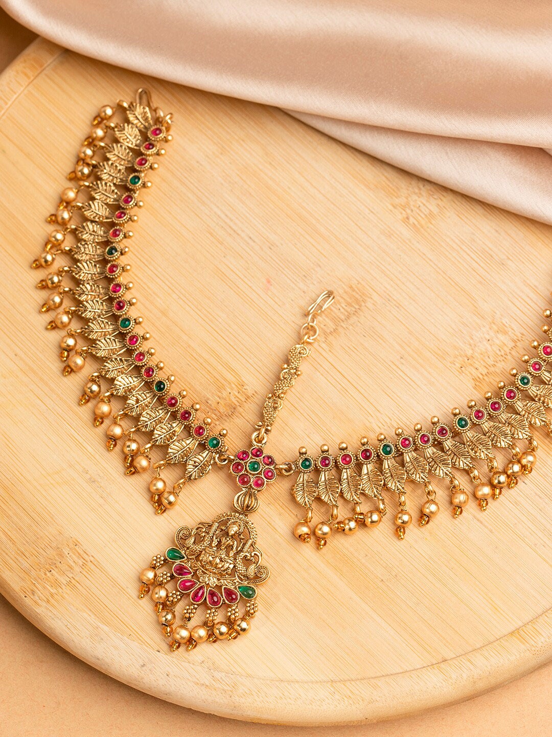 

Priyaasi Gold-Plated Stones-Studded & Beaded Matha Patti