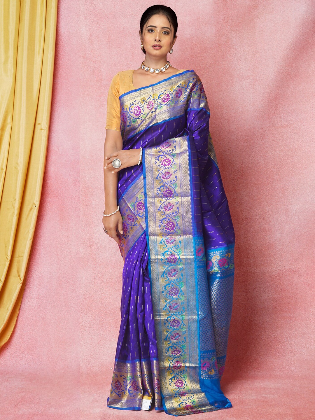 

Unnati Silks Blue & Silver-Toned Woven Design Zari Silk Blend Handloom Kanjeevaram Saree