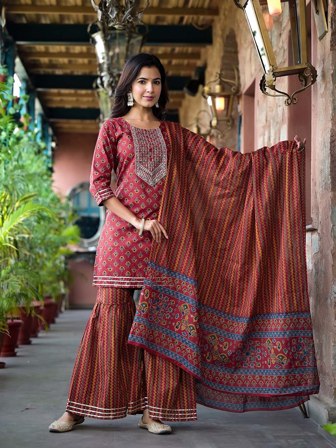 

Yufta Floral Printed Regular Sequinned Pure Cotton Kurta With Sharara & Dupatta, Rust