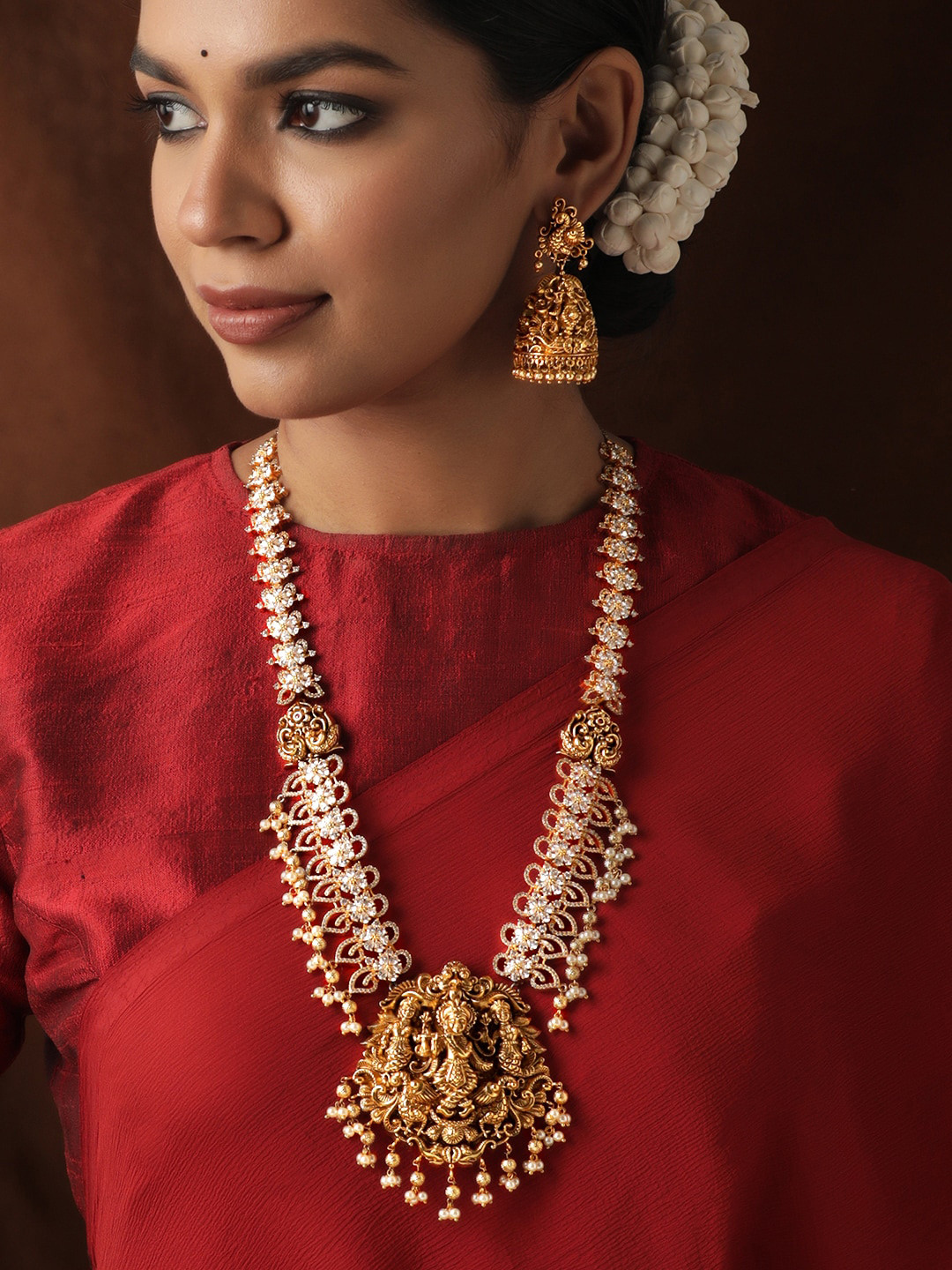 

Rubans 22K Gold Plated CZ Studded & Pearls Beaded Lakshmi Temple Necklace with Jhumkas