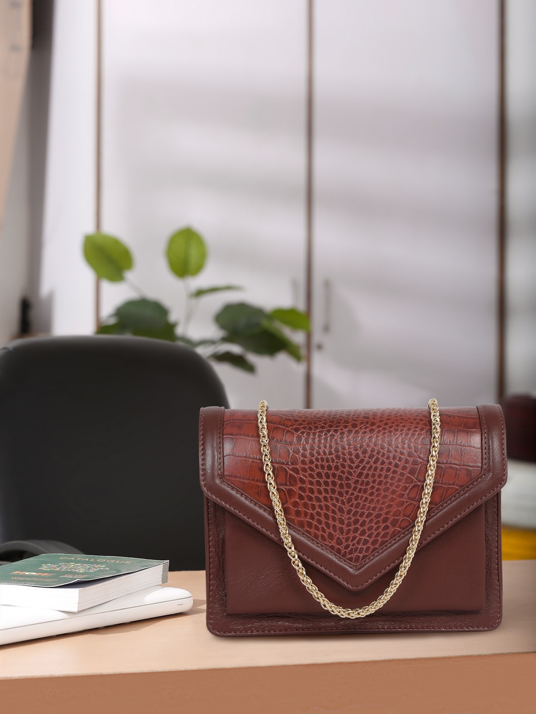 

Suvaska Textured Leather Structured Sling Bag, Brown