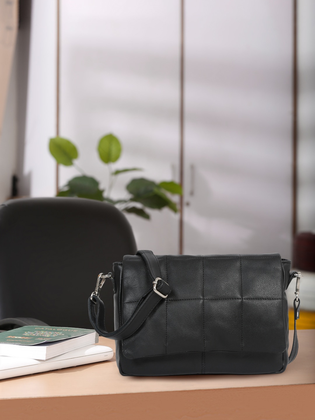 

Suvaska Textured Leather Structured Sling Bag, Black