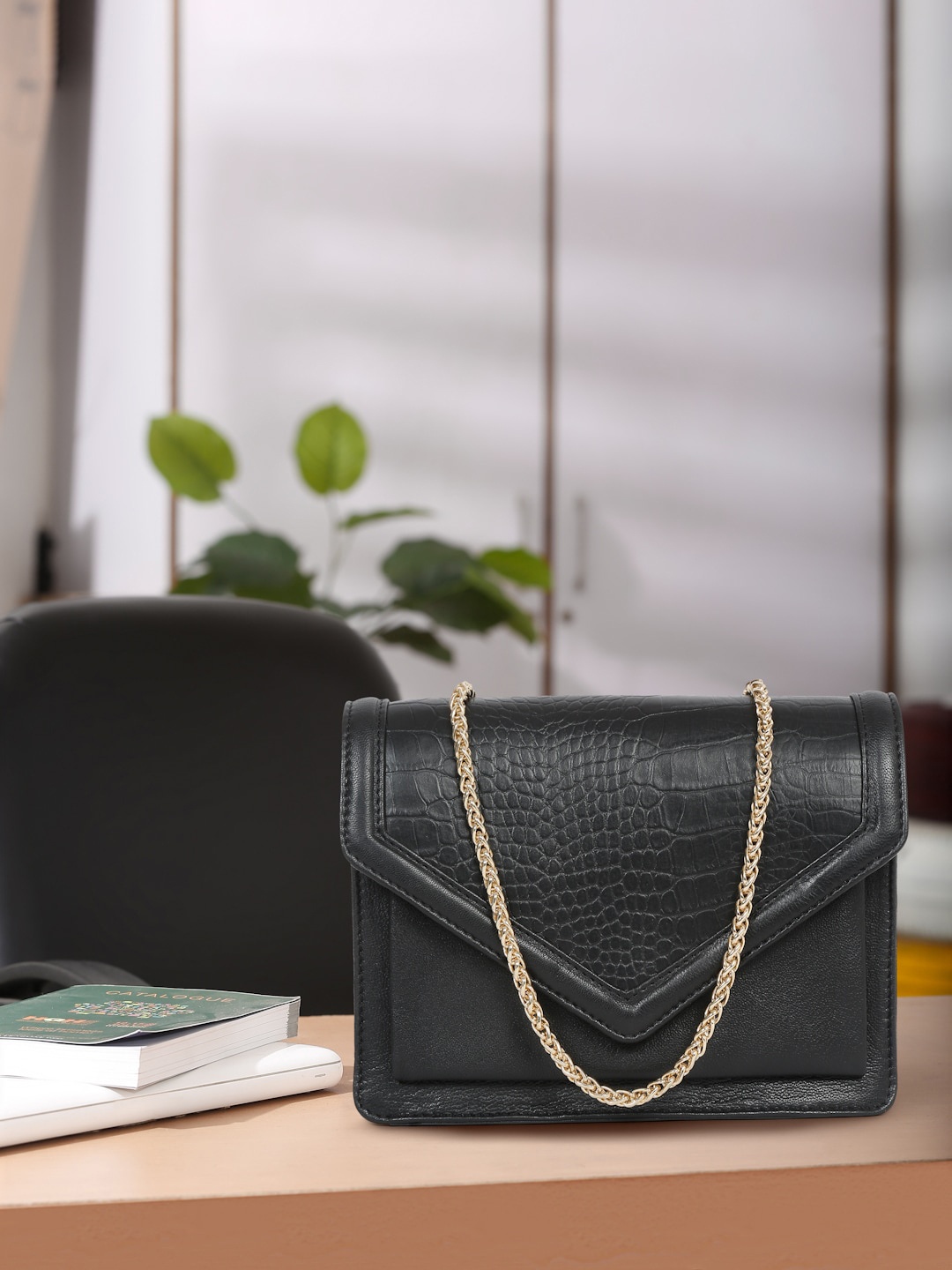 

Suvaska Textured Leather Structured Sling Bag, Black