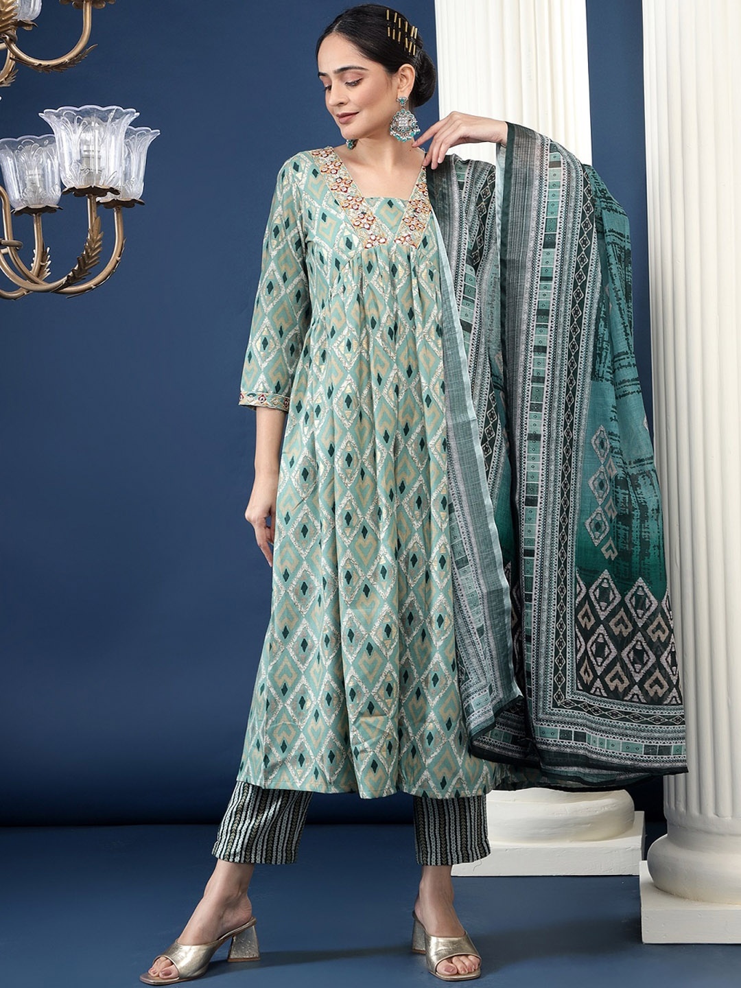 

Bani Women Geometric Printed Thread Work Empire A-Line Kurta with Trouser & Dupatta, Green
