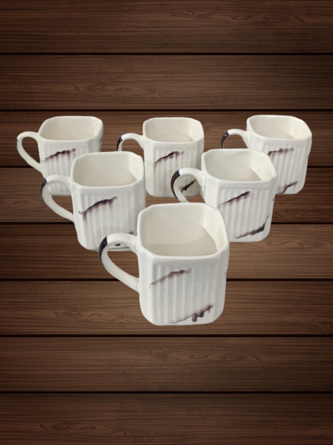 

Love Unlimited White & Black 6 Pieces Textured Ceramic Glossy Cups 125 ML Each