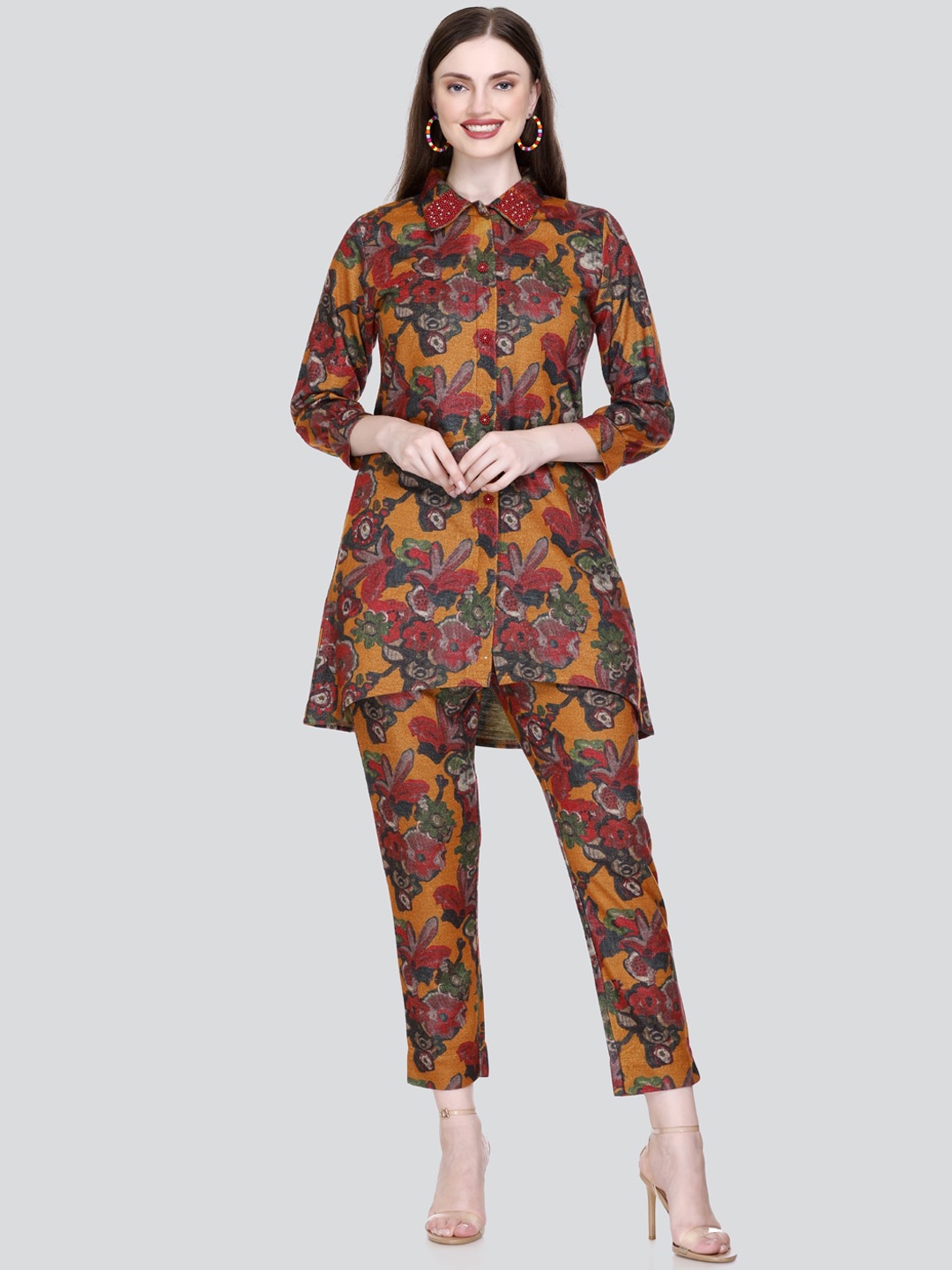 

Elthia Floral Printed Shirt Collar Cuffed Sleeve Acrylic A-Line Kurta With Trousers, Mustard