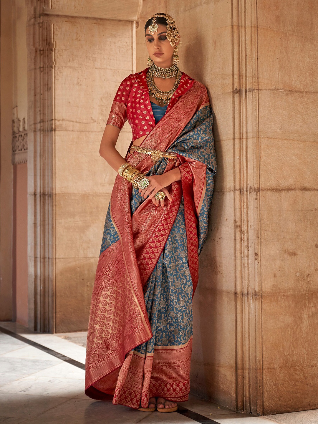 

Mitera Blue & Red Ethnic Motifs Woven Design Zari Silk Blend Banarasi Saree
