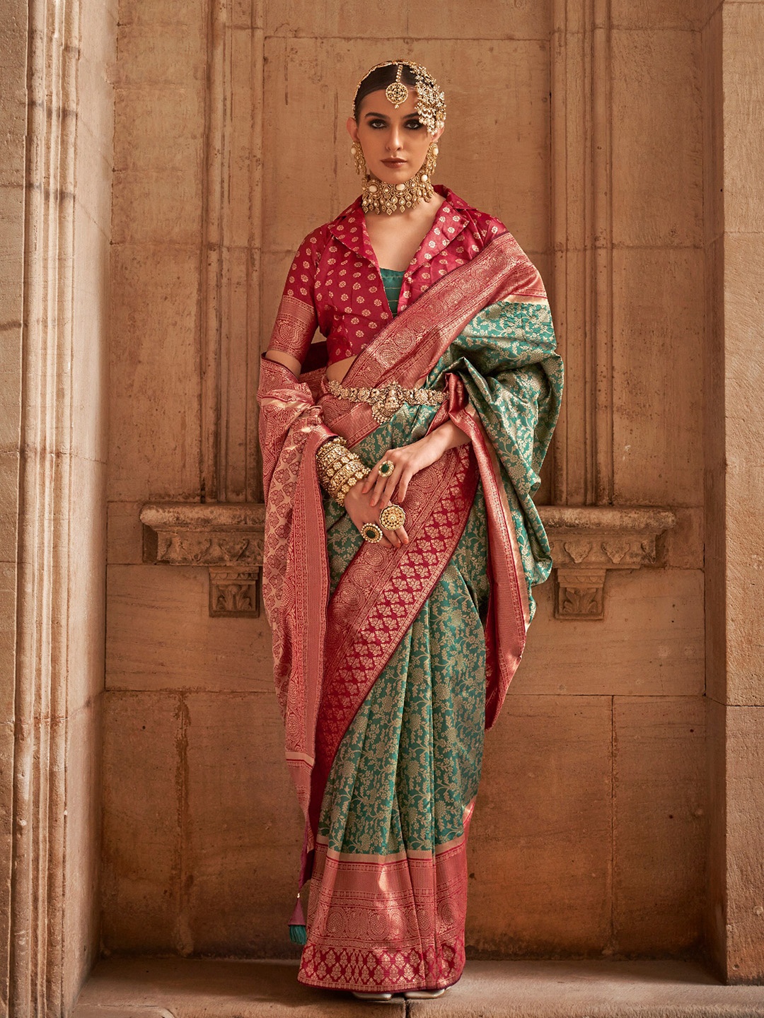 

Mitera Green & Red Ethnic Motifs Woven Design Zari Banarasi Saree