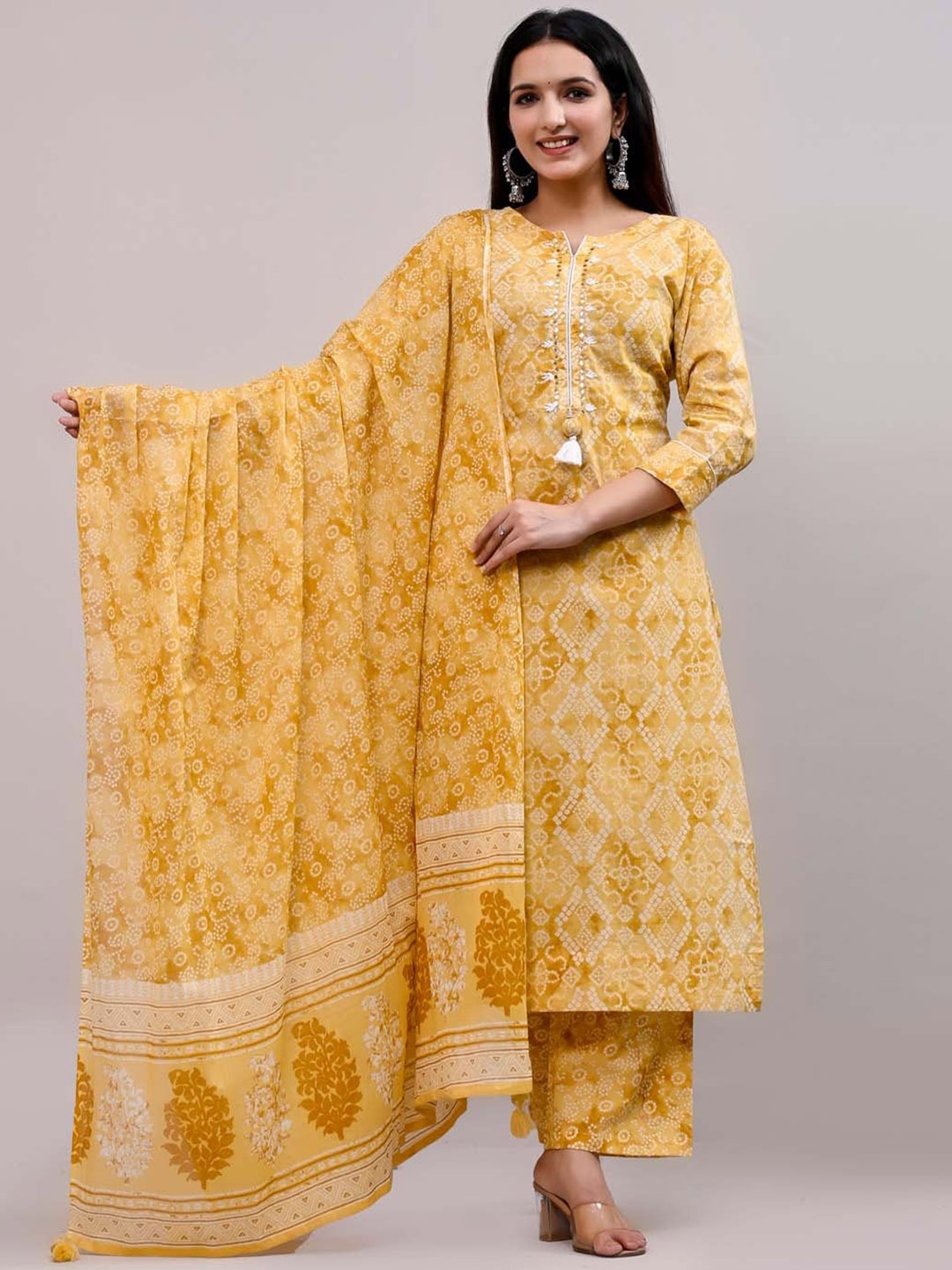 

Meena Bazaar Bandhani Printed Regular Mirror Work Kurta With Trousers & Dupatta, Yellow