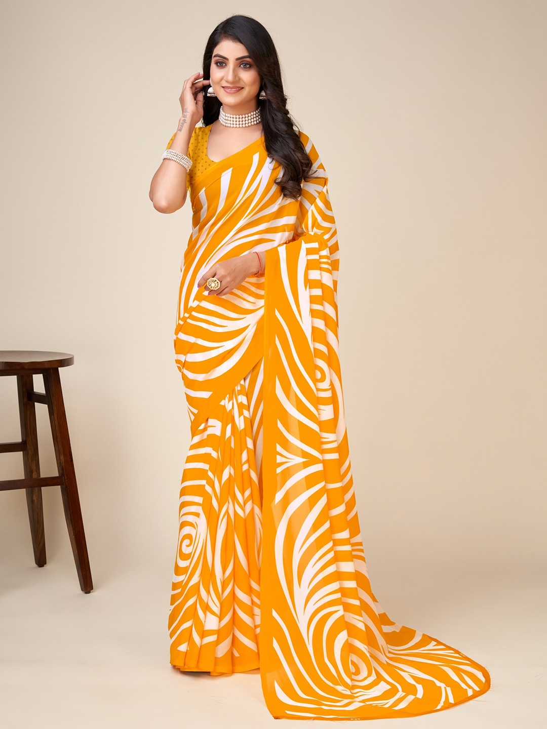 

Ambuja International Abstract Printed Saree, Yellow