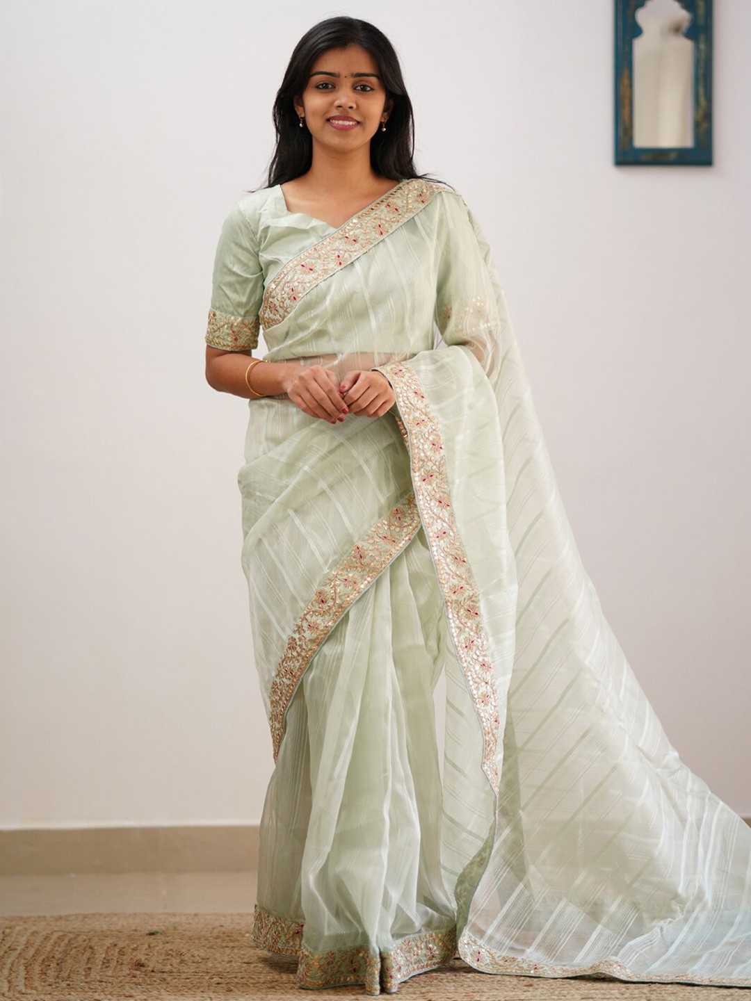 

Mitera Green & Gold-Toned Striped Embroidered Organza Saree