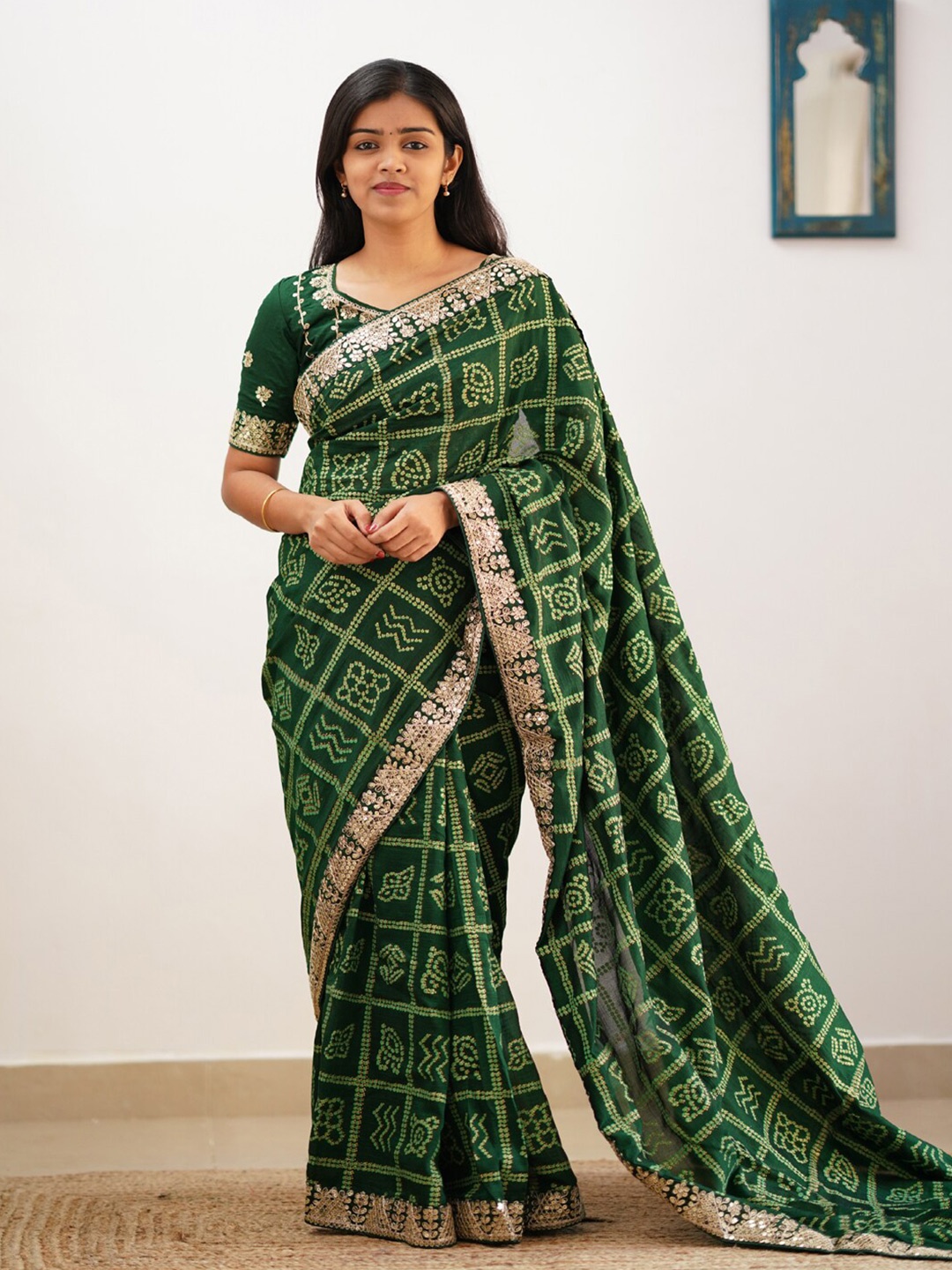 

Mitera Green & White Bandhani Printed Embroidered Saree