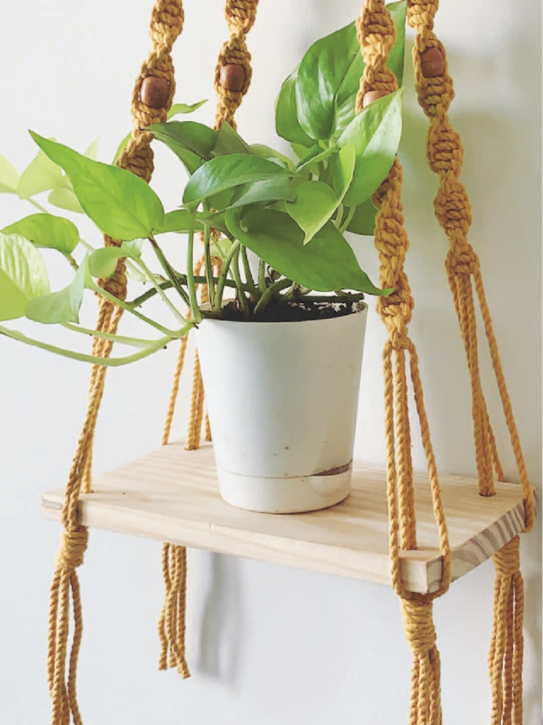 

Story of Knots Wall Shelf, Yellow