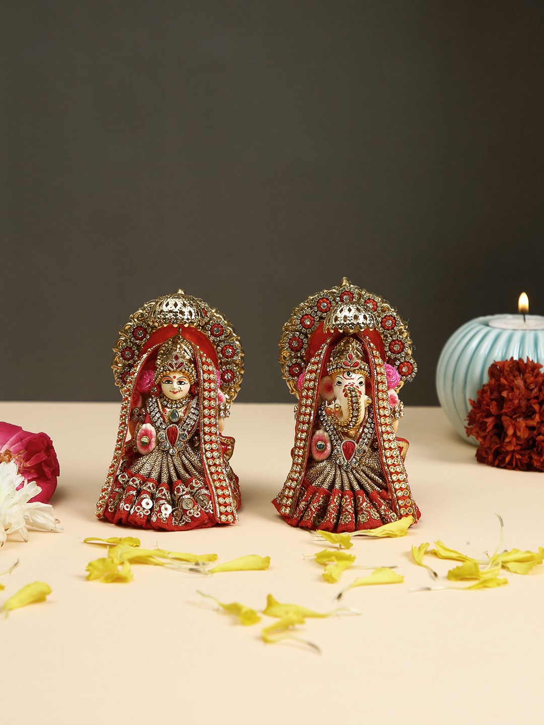 

Aapno Rajasthan Red & Golden Textured Laxmi Ganesh Idol Showpiece