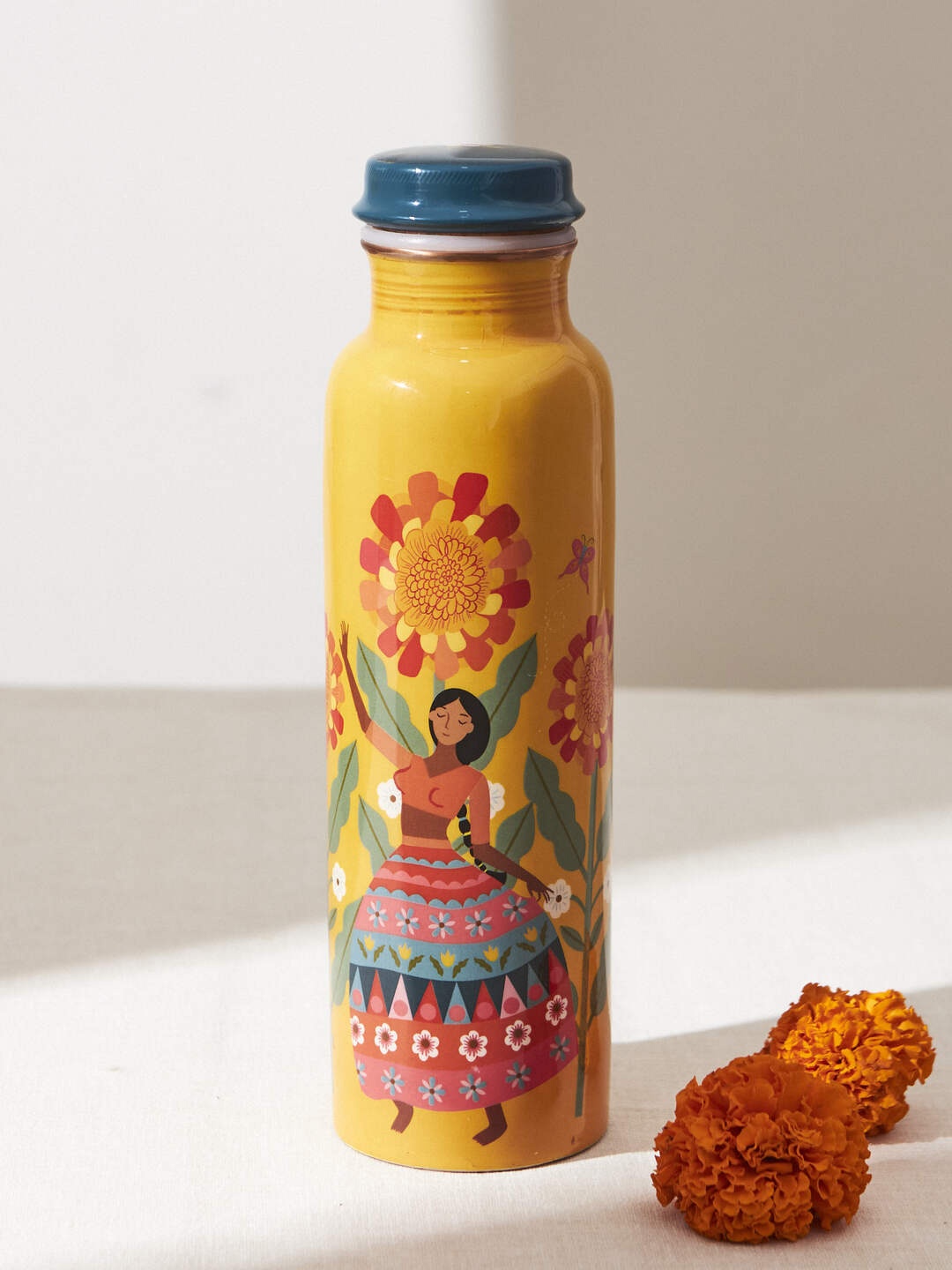 

Chumbak Marigold Yellow Printed Copper Water Bottle