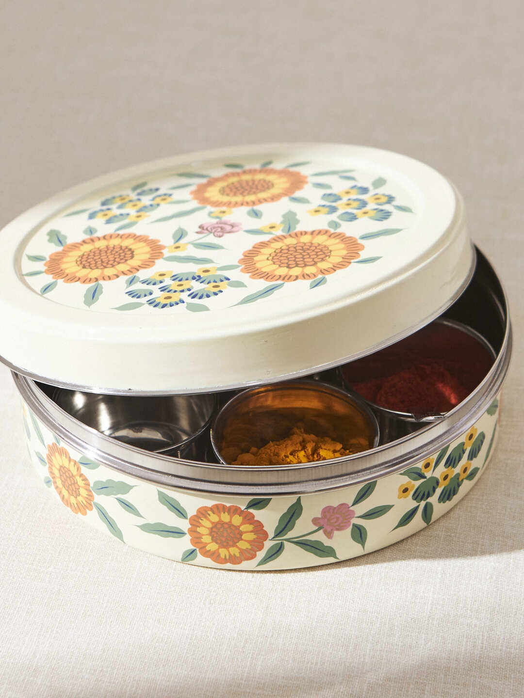 

Chumbak Marigold Off White & Yellow Printed Stainless Steel Spicebox