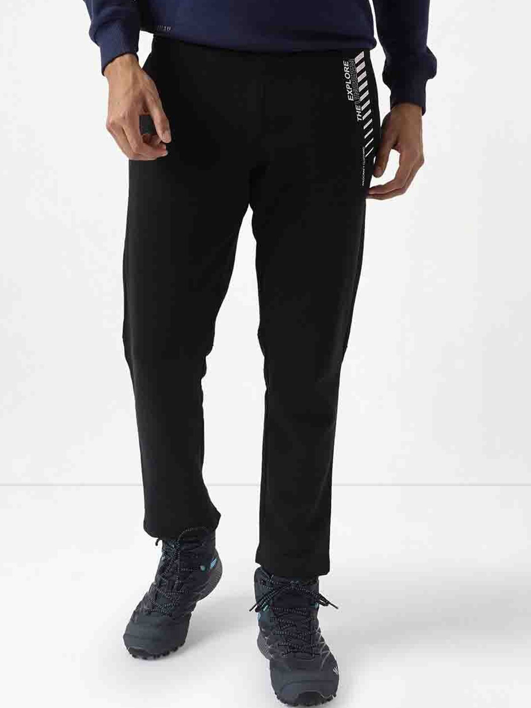 

Wildcraft Men Typography Printed Cotton Anti Odour Track Pants, Black