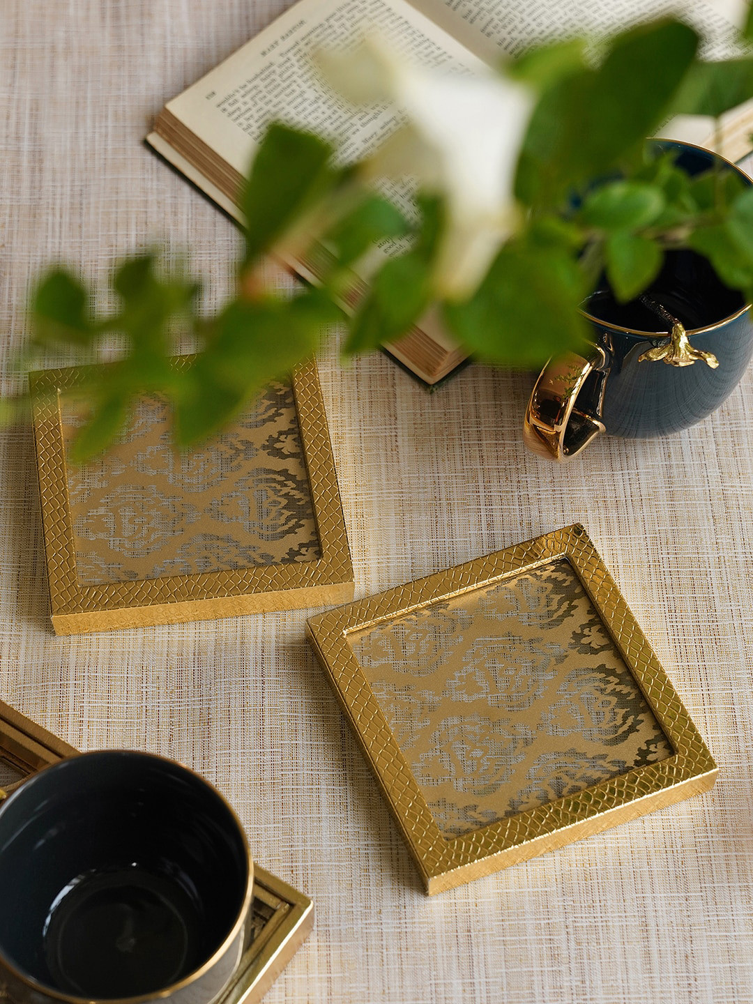 

Pure Home and Living Gold Toned 2 Pieces Printed Glass Faux Leather Coasters