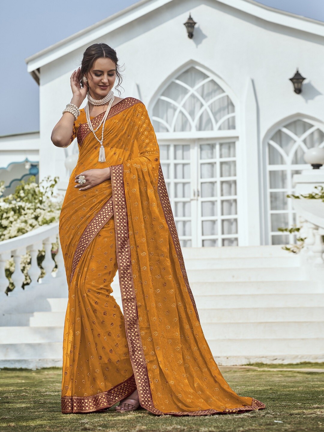 

Mitera Floral Embroidered Mirror Work Pure Chiffon Saree, Yellow
